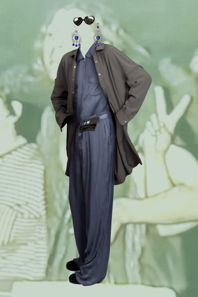 A relaxed gray silk long-sleeve shirt paired with wide-leg blue pants.