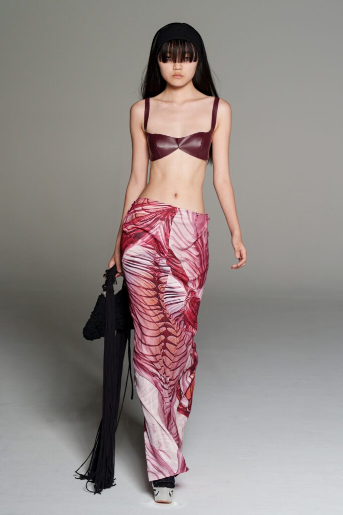 red leather bustier and printed maxi skirt