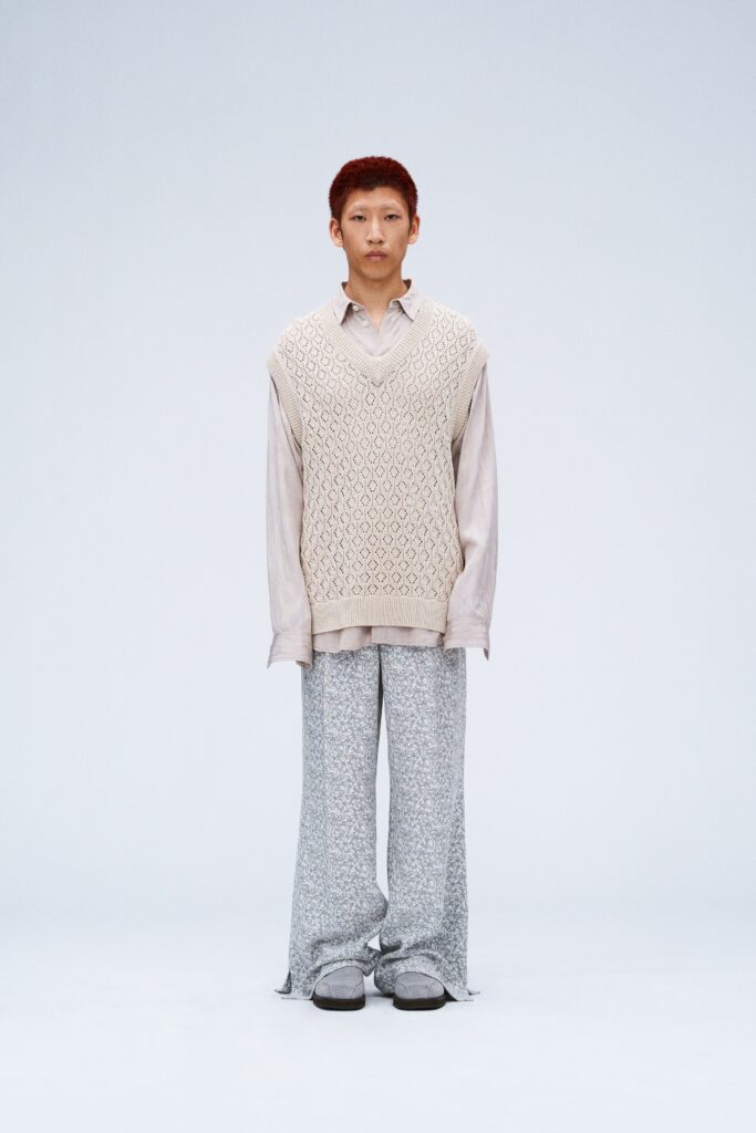 beige knitted sweater white shirt gray wide-leg pants