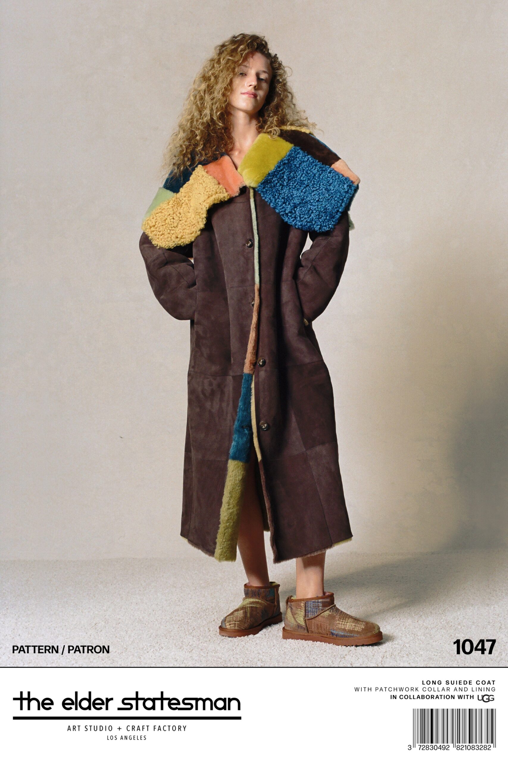 A relaxed brown suede coat featuring a color-blocked design and a collared neckline.