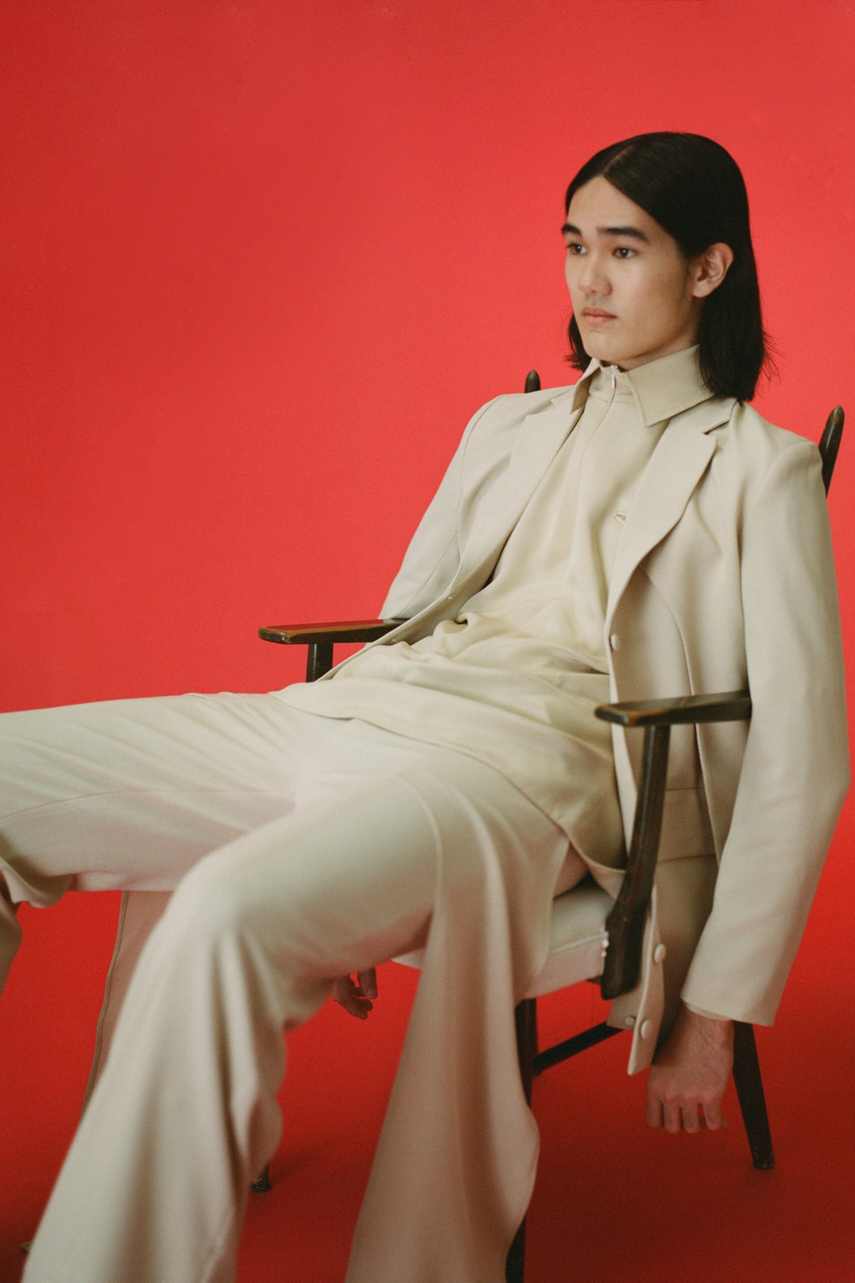 beige fitted suit with straight-leg pants