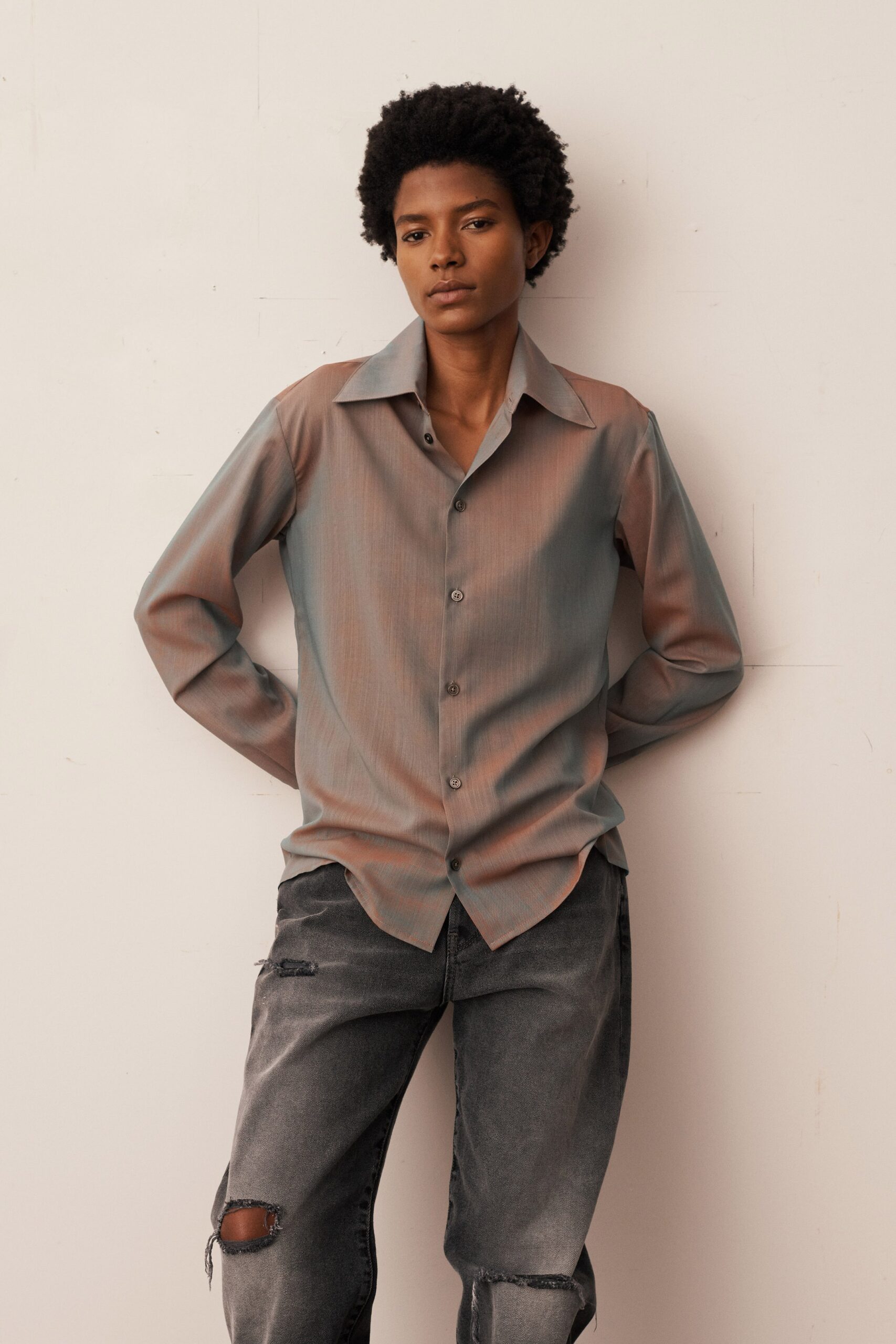 blue brown fitted shirt with gray jeans