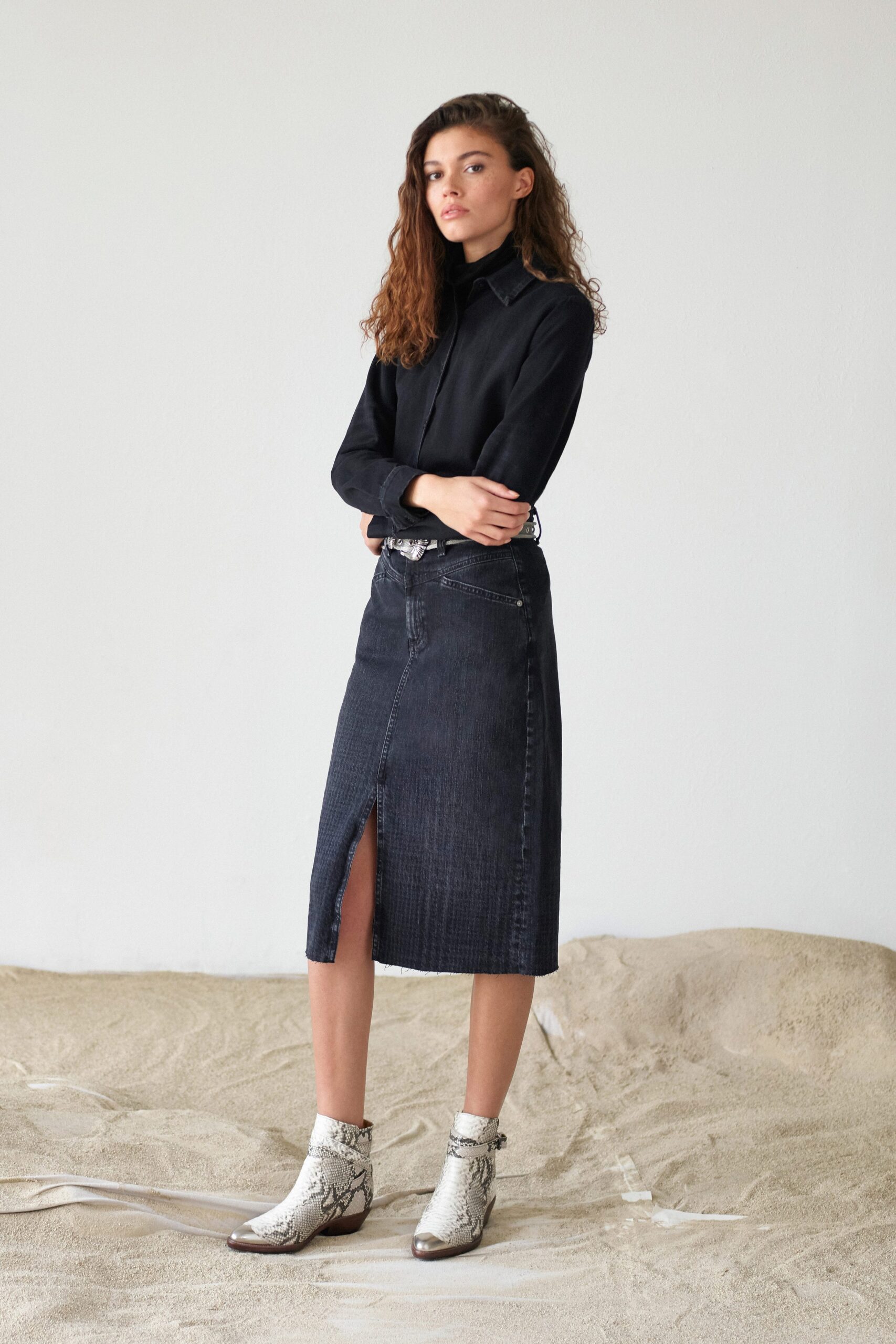 black shirt blue denim skirt
