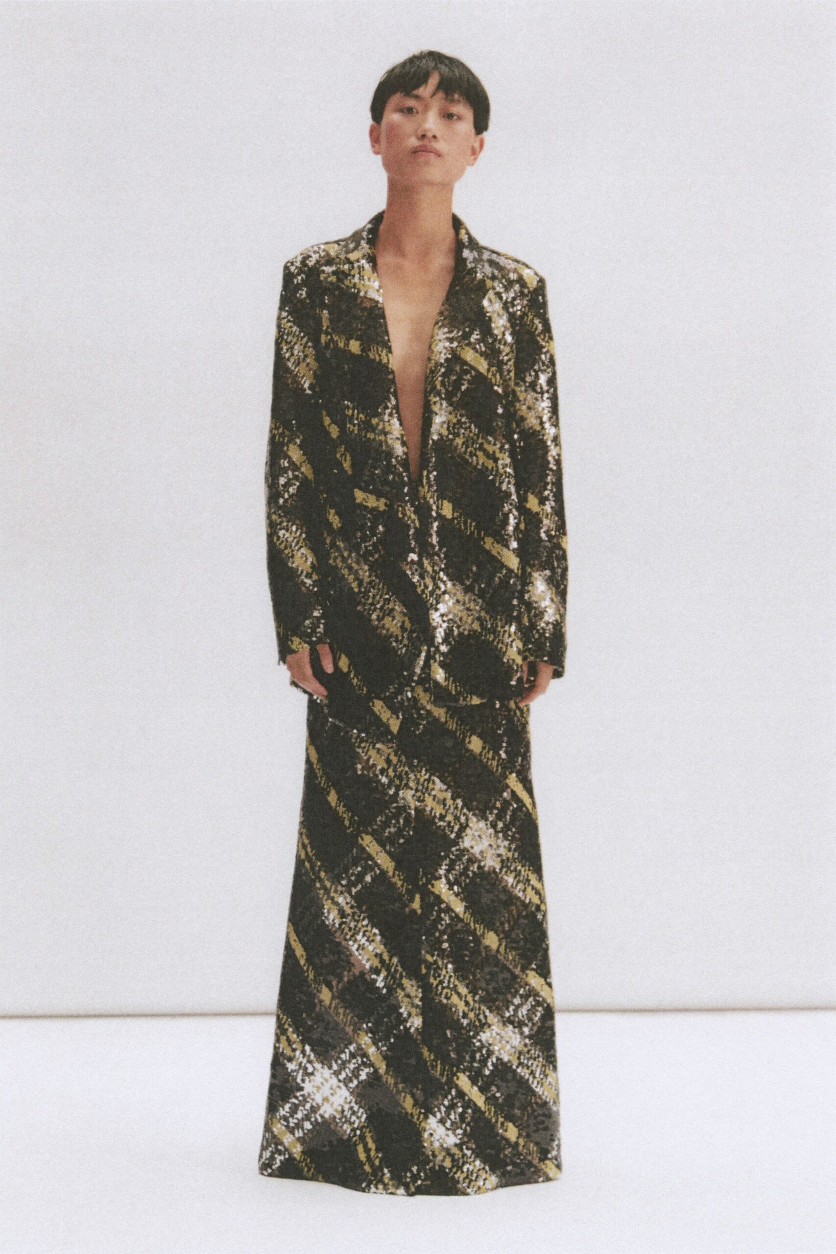 black and gold sequin blazer and skirt