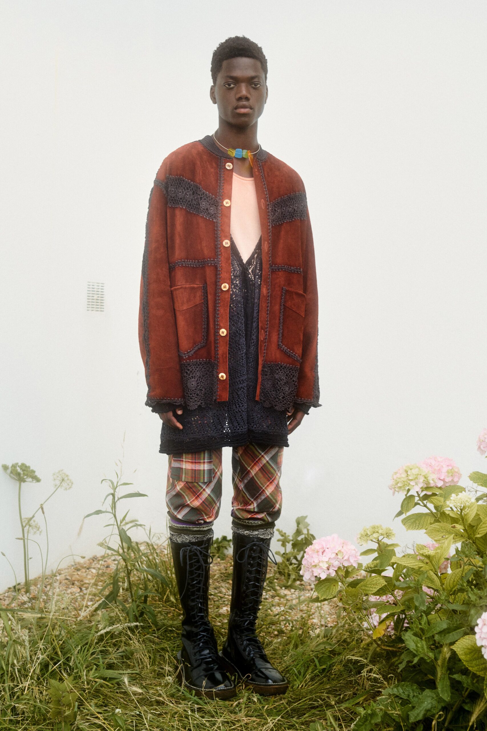 red suede relaxed jacket with checked pants