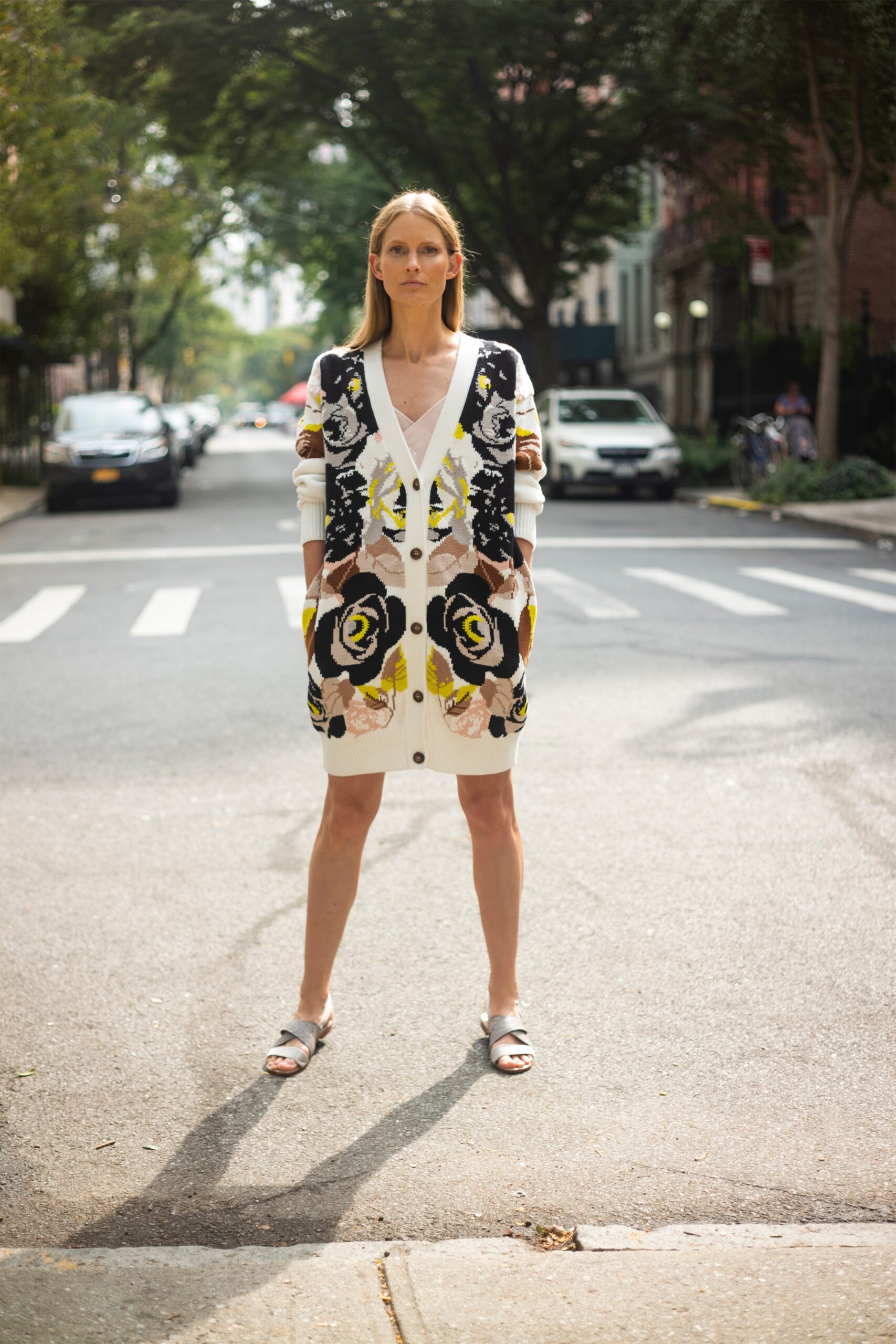 white cotton long-sleeve v-neck fitted floral buttoned dress
