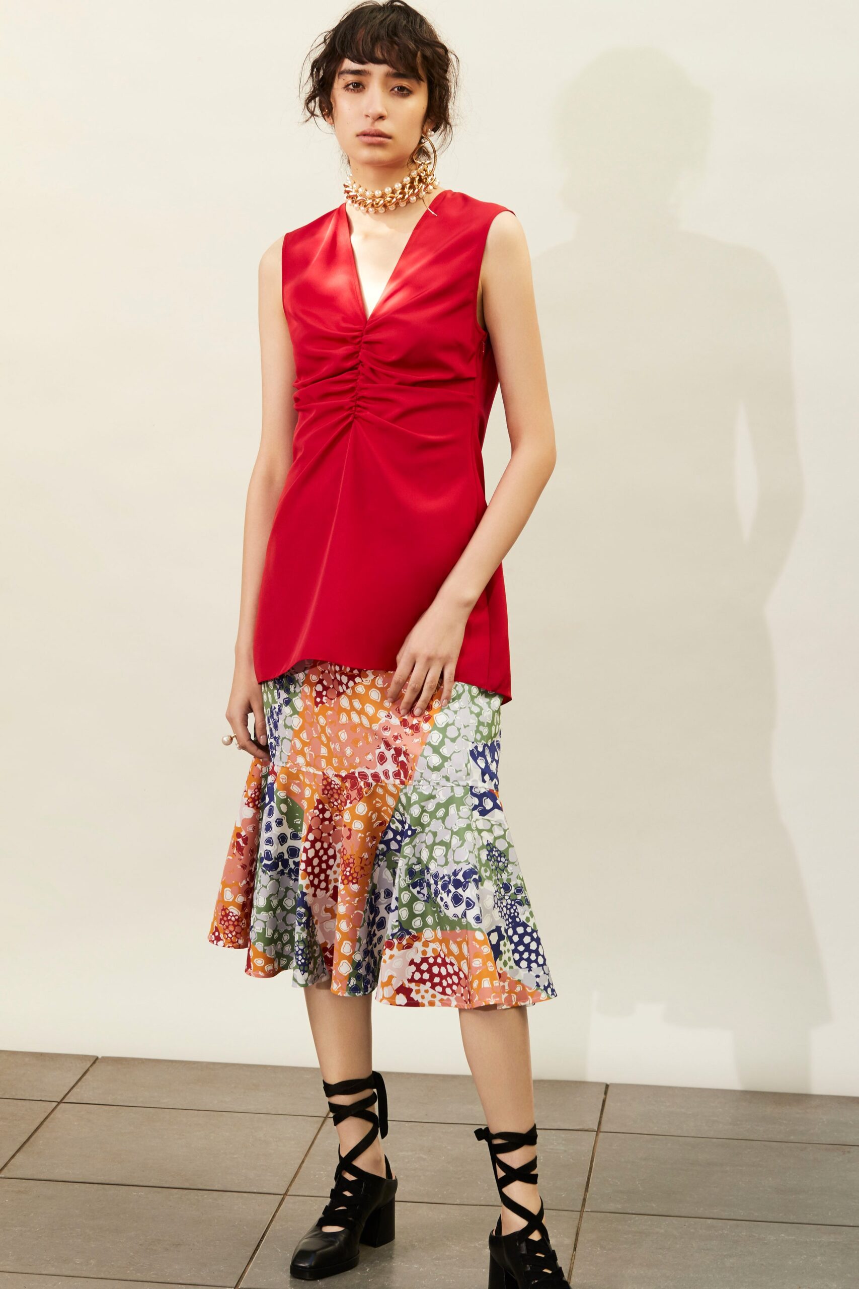 red silk top with multi skirt