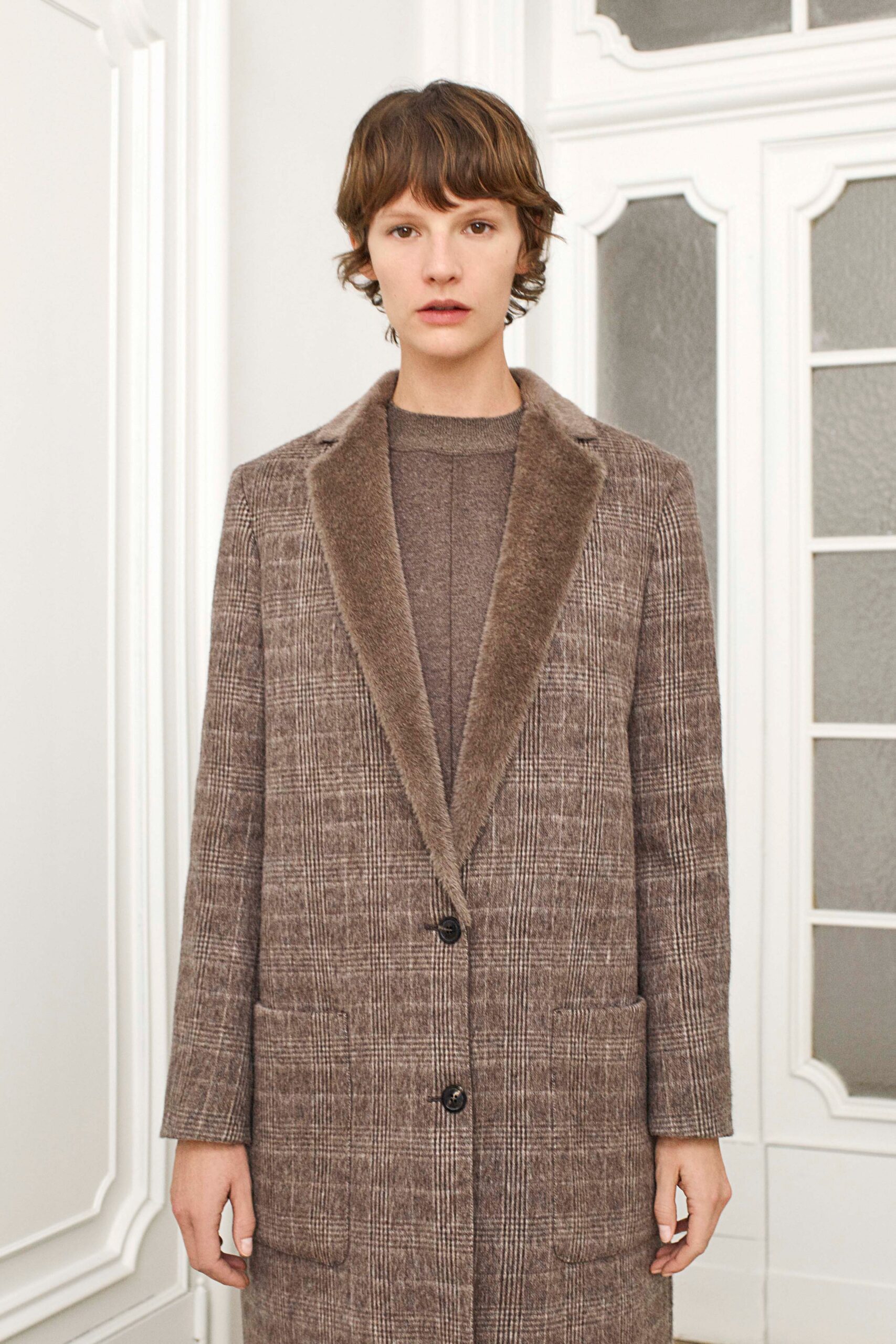brown wool coat and sweater
