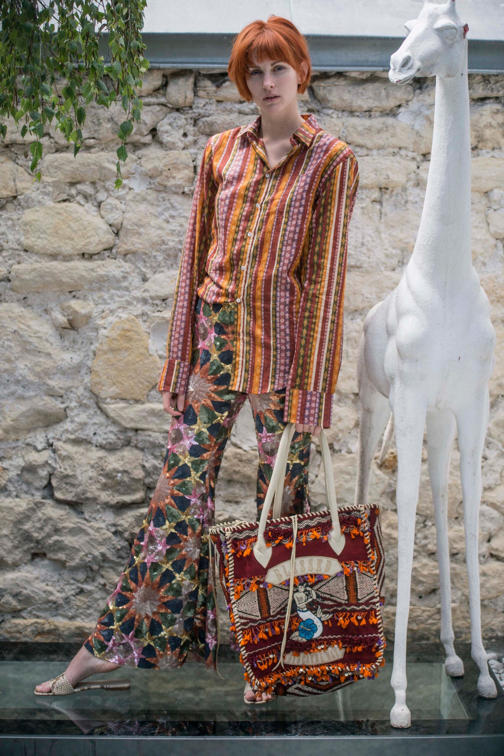 striped shirt and flared pants