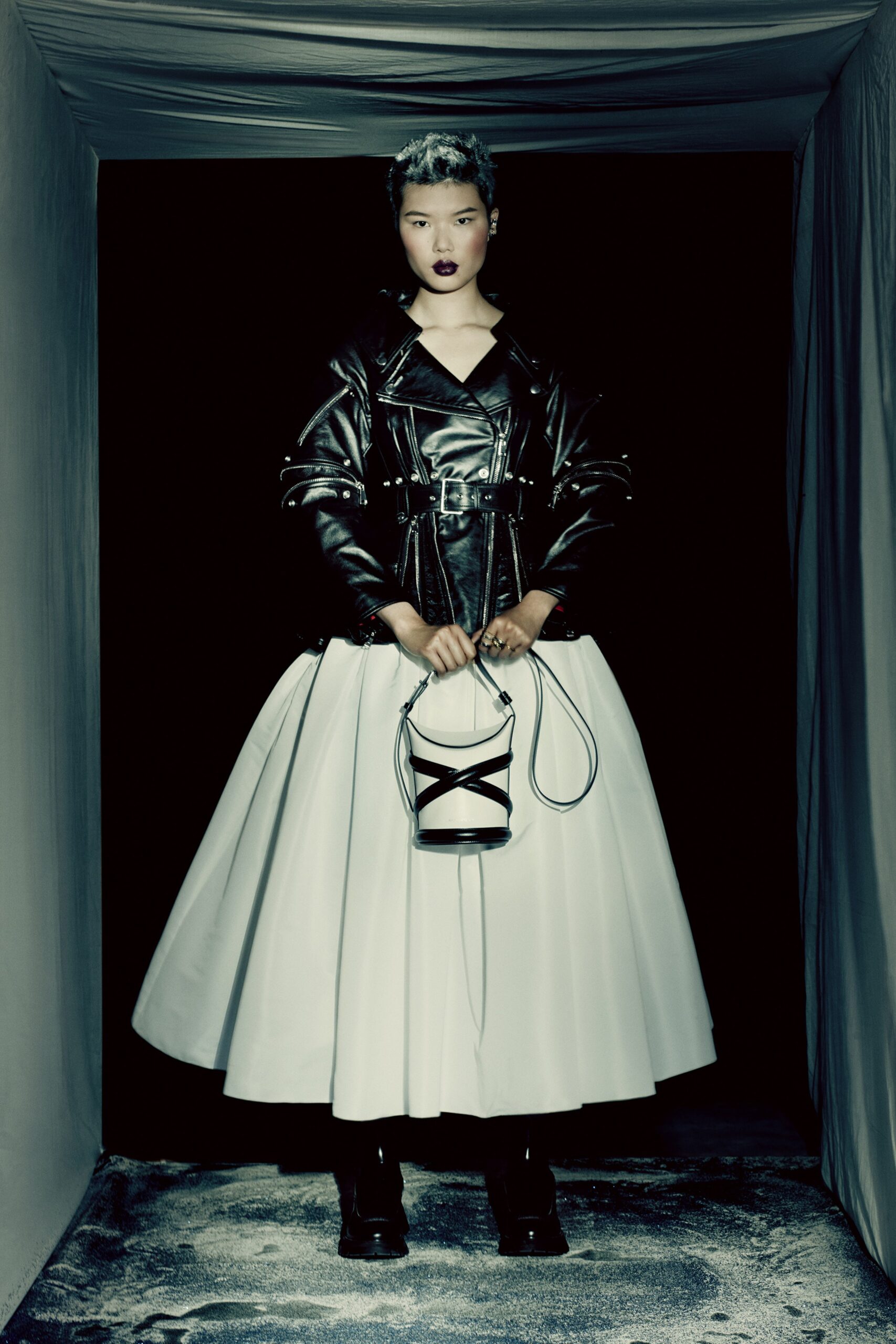 black leather jacket and white dress