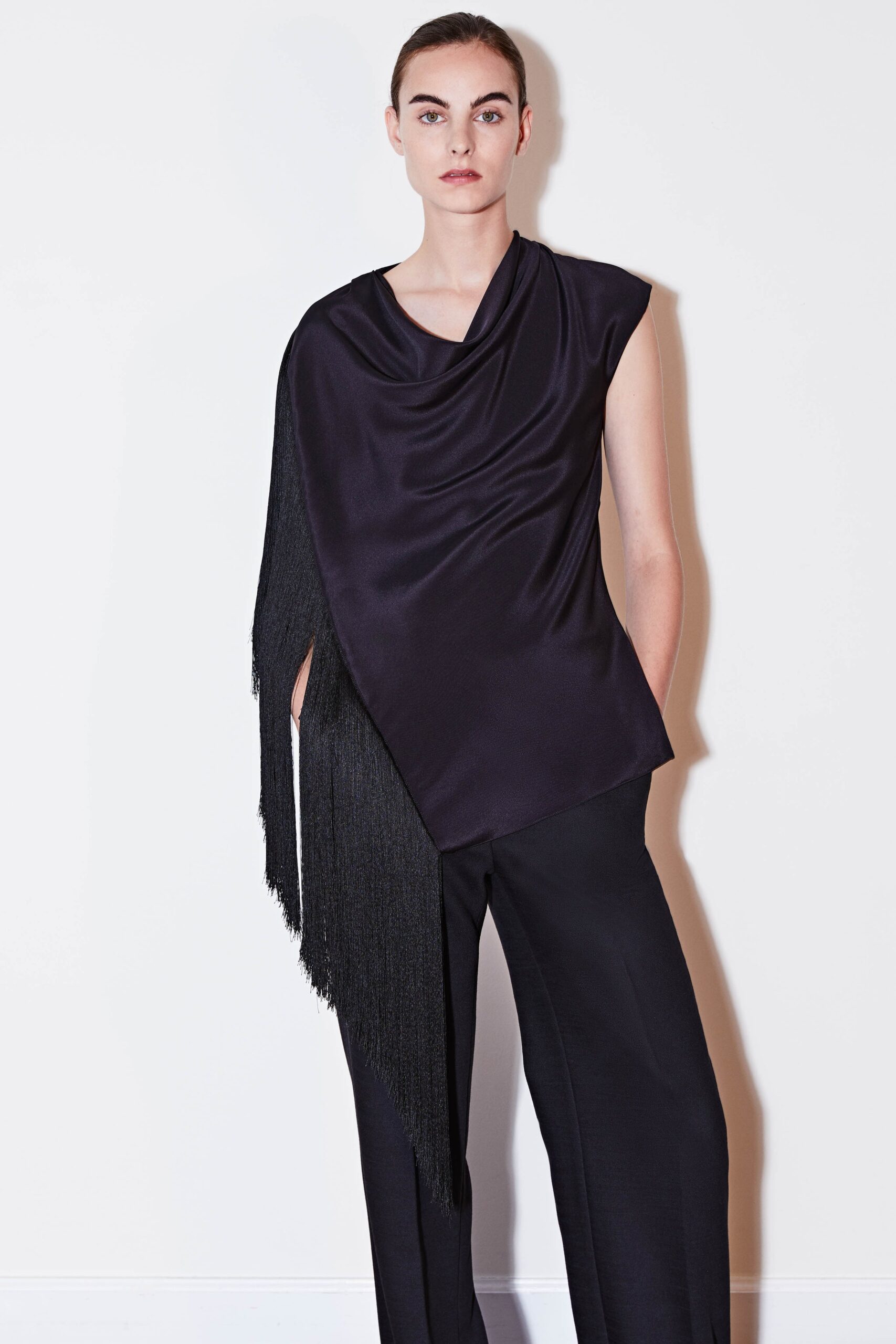 black silk fitted top and tailored pants