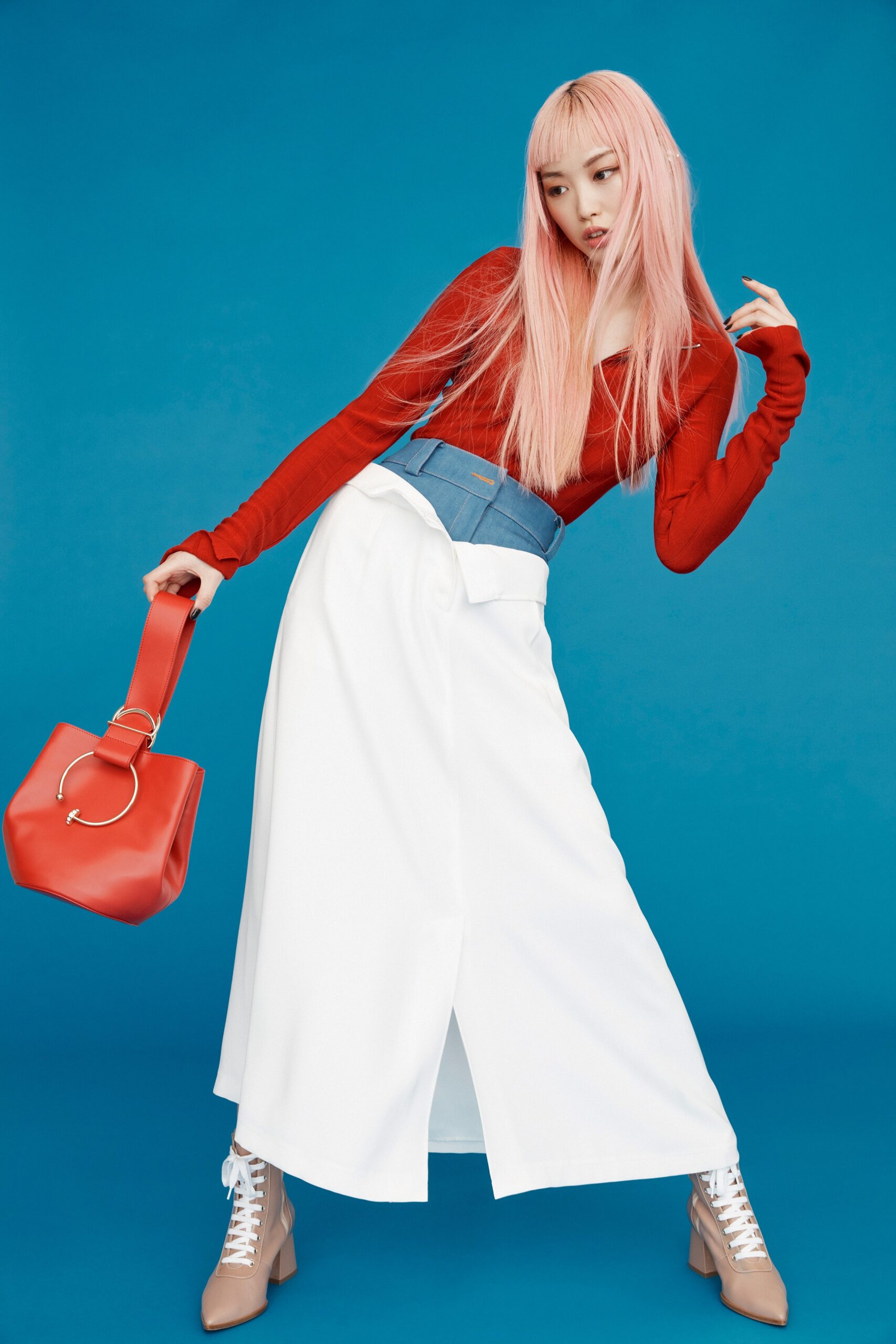 red fitted top with white skirt