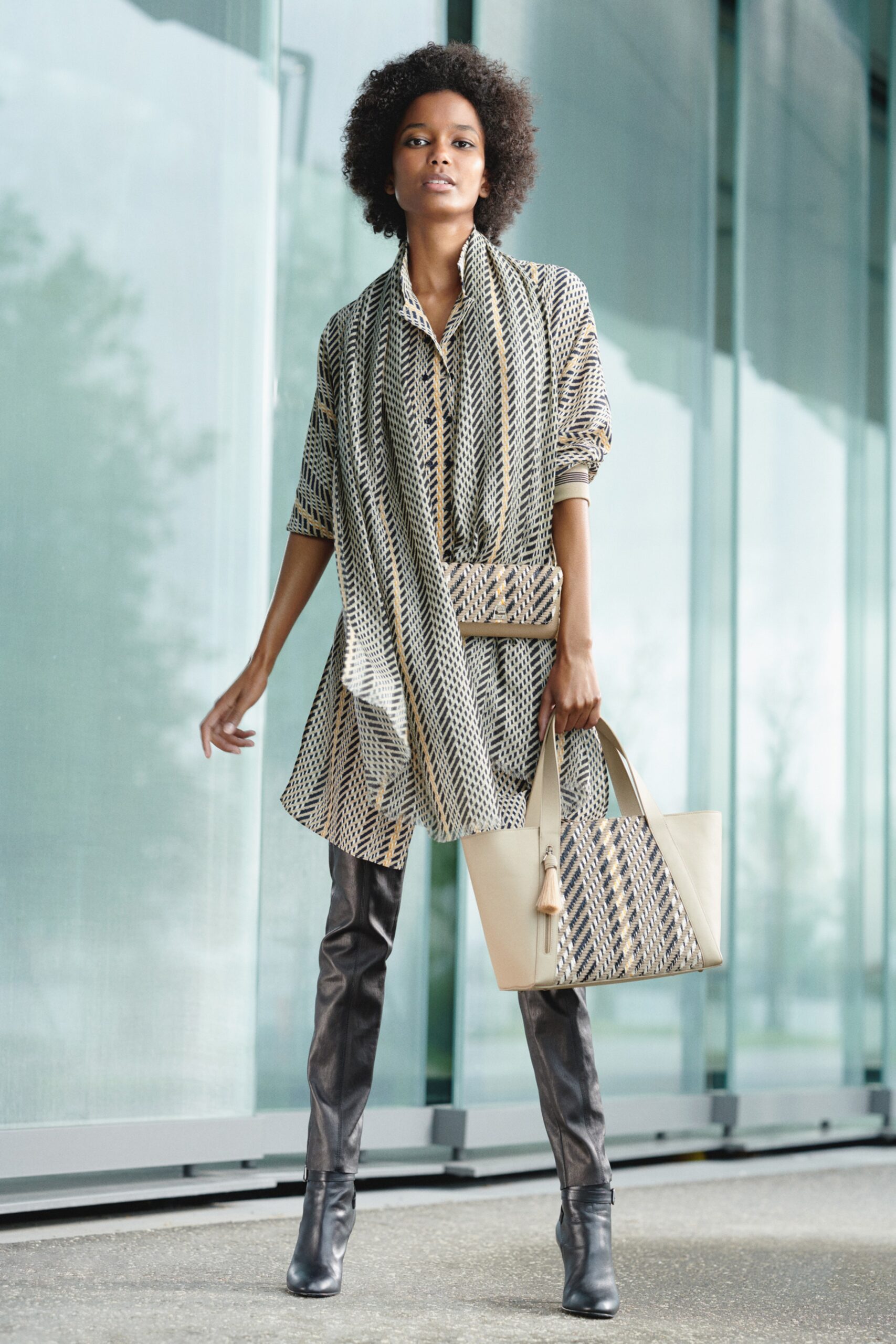 beige printed shirt-dress with black boots
