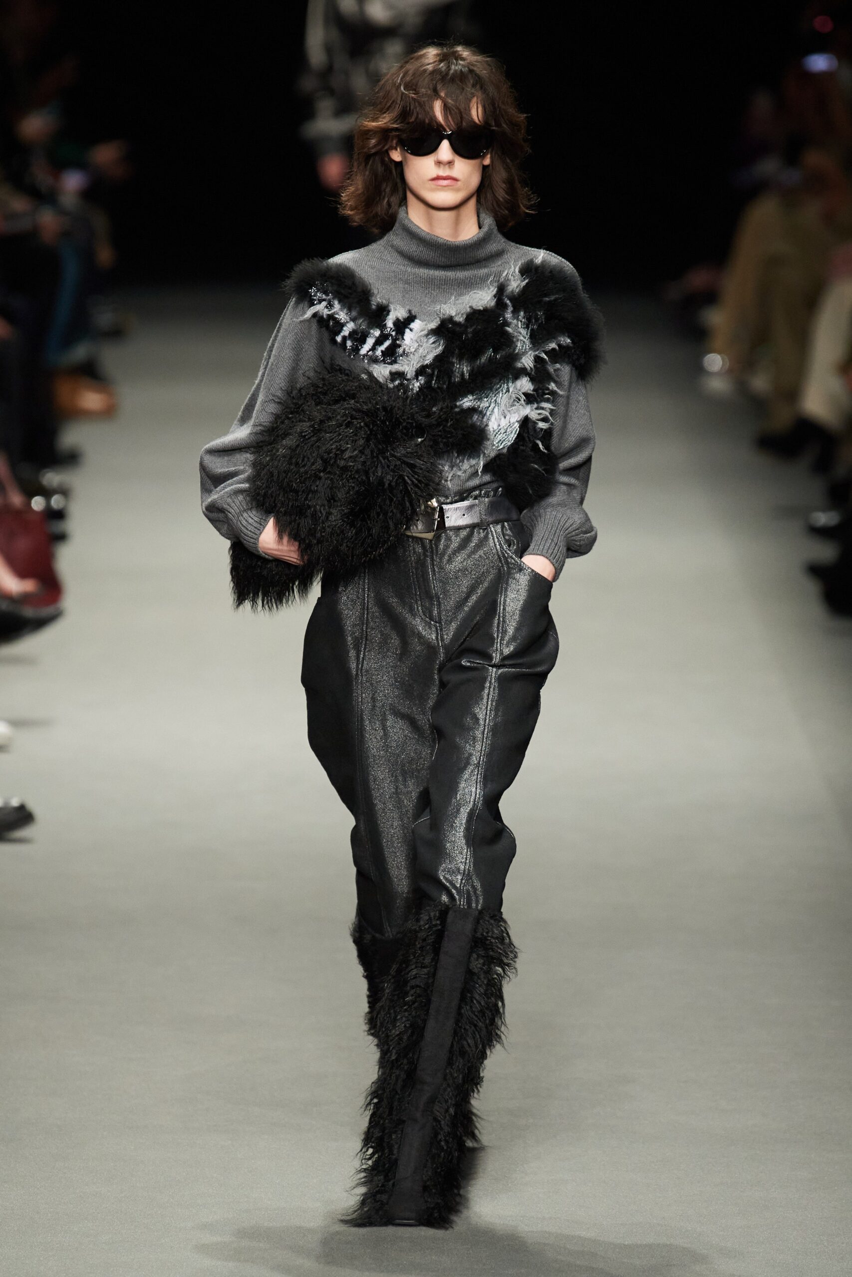 gray wool sweater with black leather pants