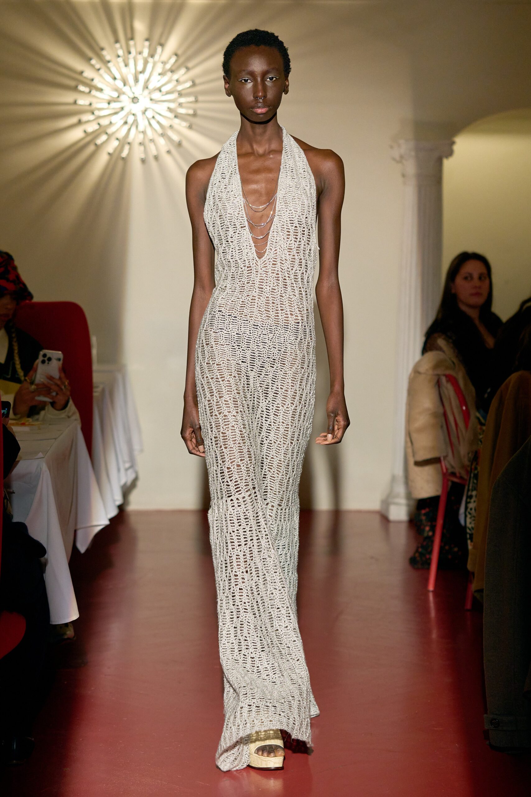 white sheer sleeveless gown