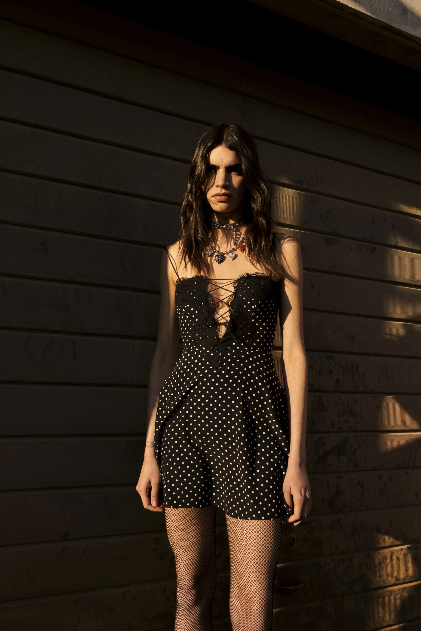 black and white polka-dot romper