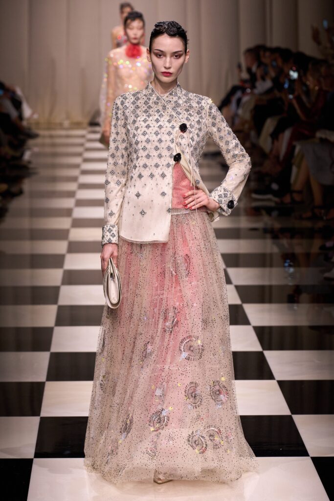 white embroidered blouse with pink tulle skirt