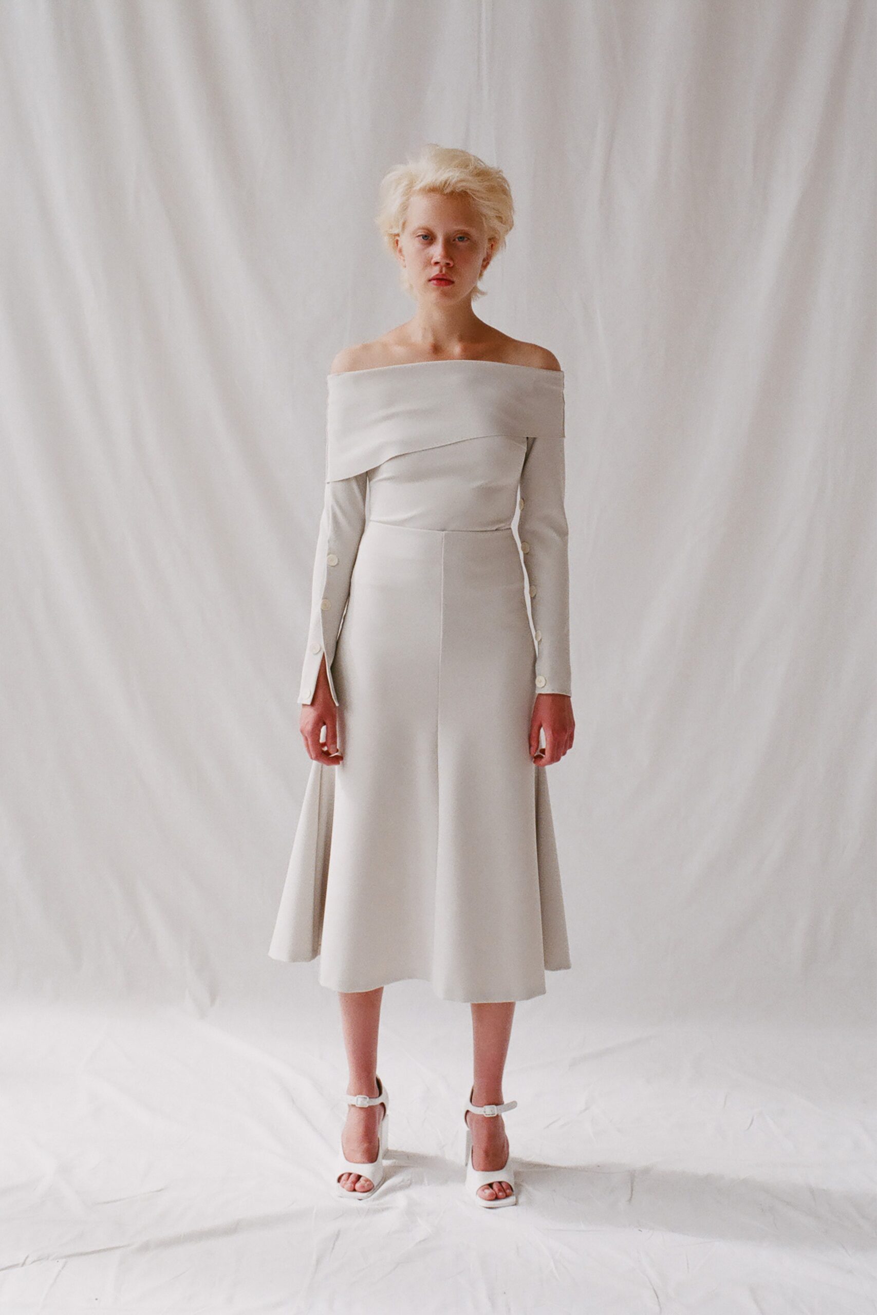 white off-shoulder midi dress