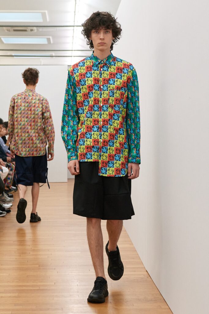 A relaxed-fit multicolor printed shirt with long sleeves paired with relaxed shorts.