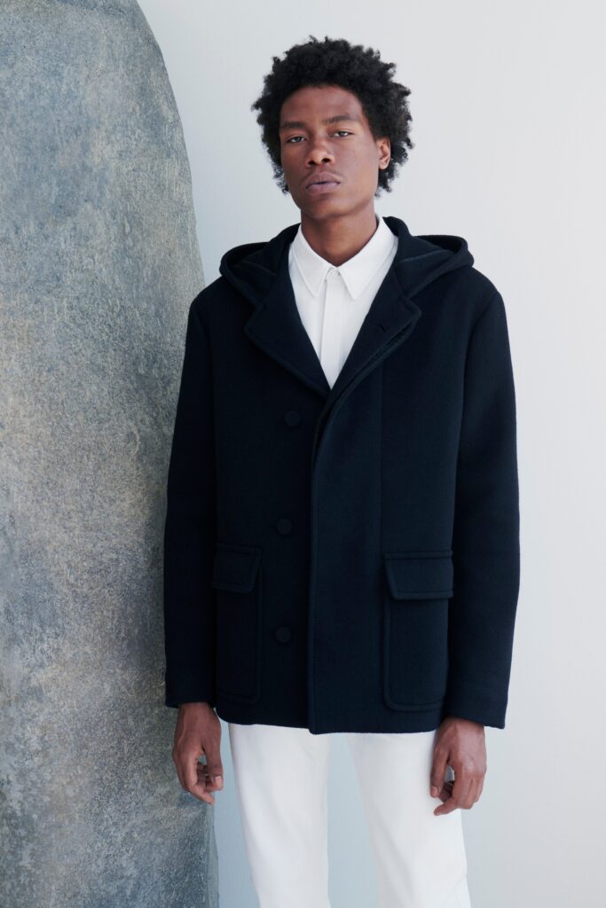 black wool jacket with white shirt and pants