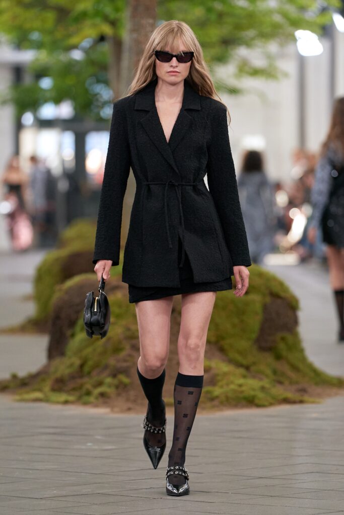 black fitted blazer with shorts