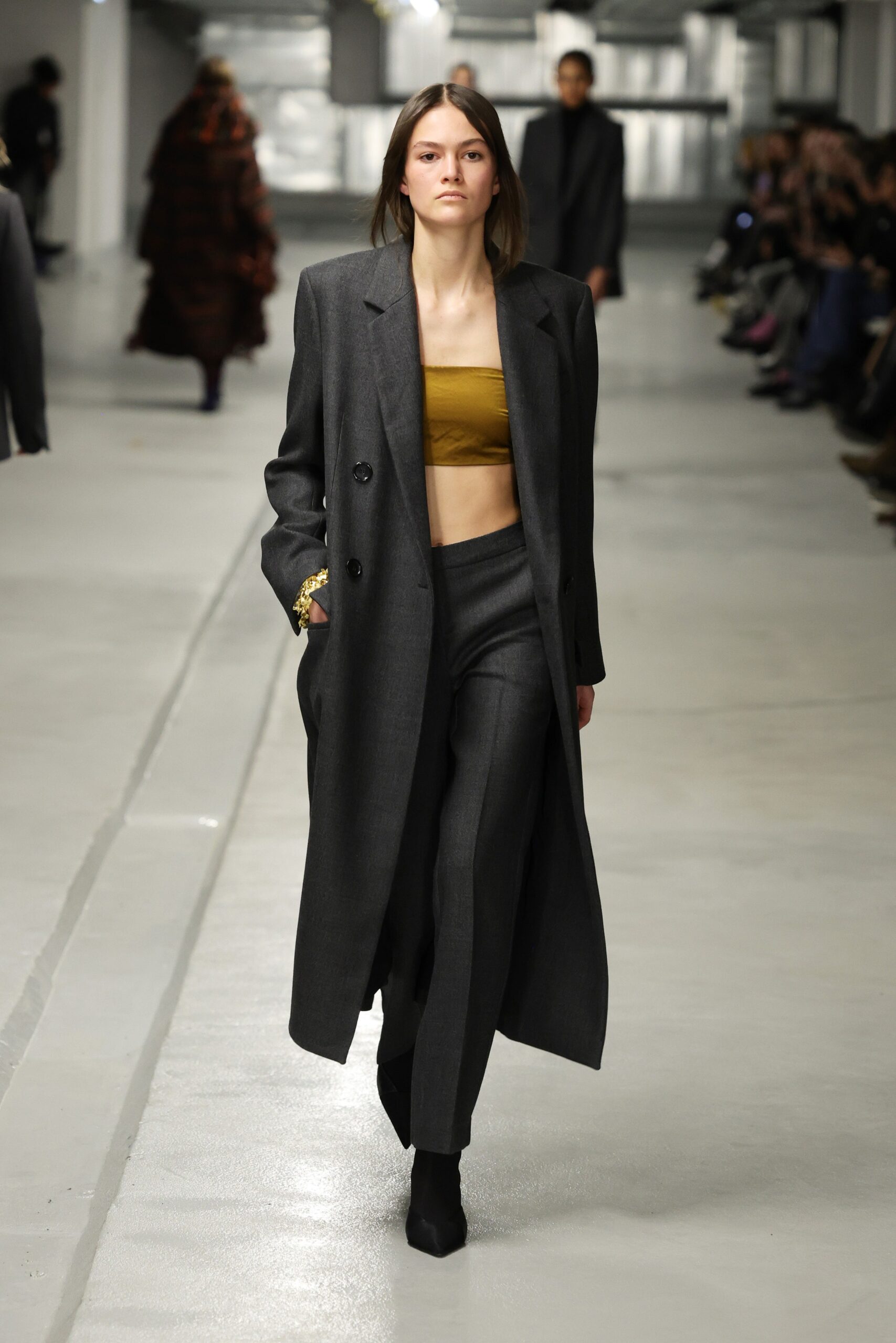 gray wool tailored coat and pants with gold silk crop top