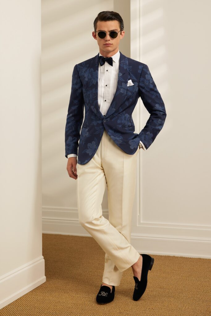 blue floral blazer with beige pants