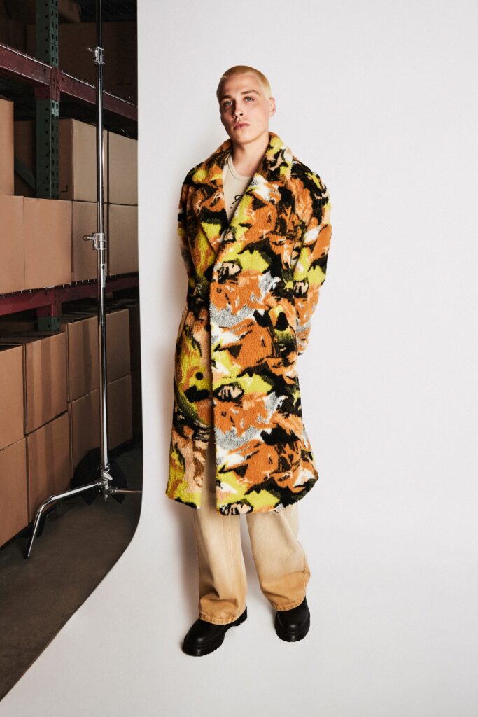 A relaxed multicolor faux-fur coat with long sleeves and a printed design.