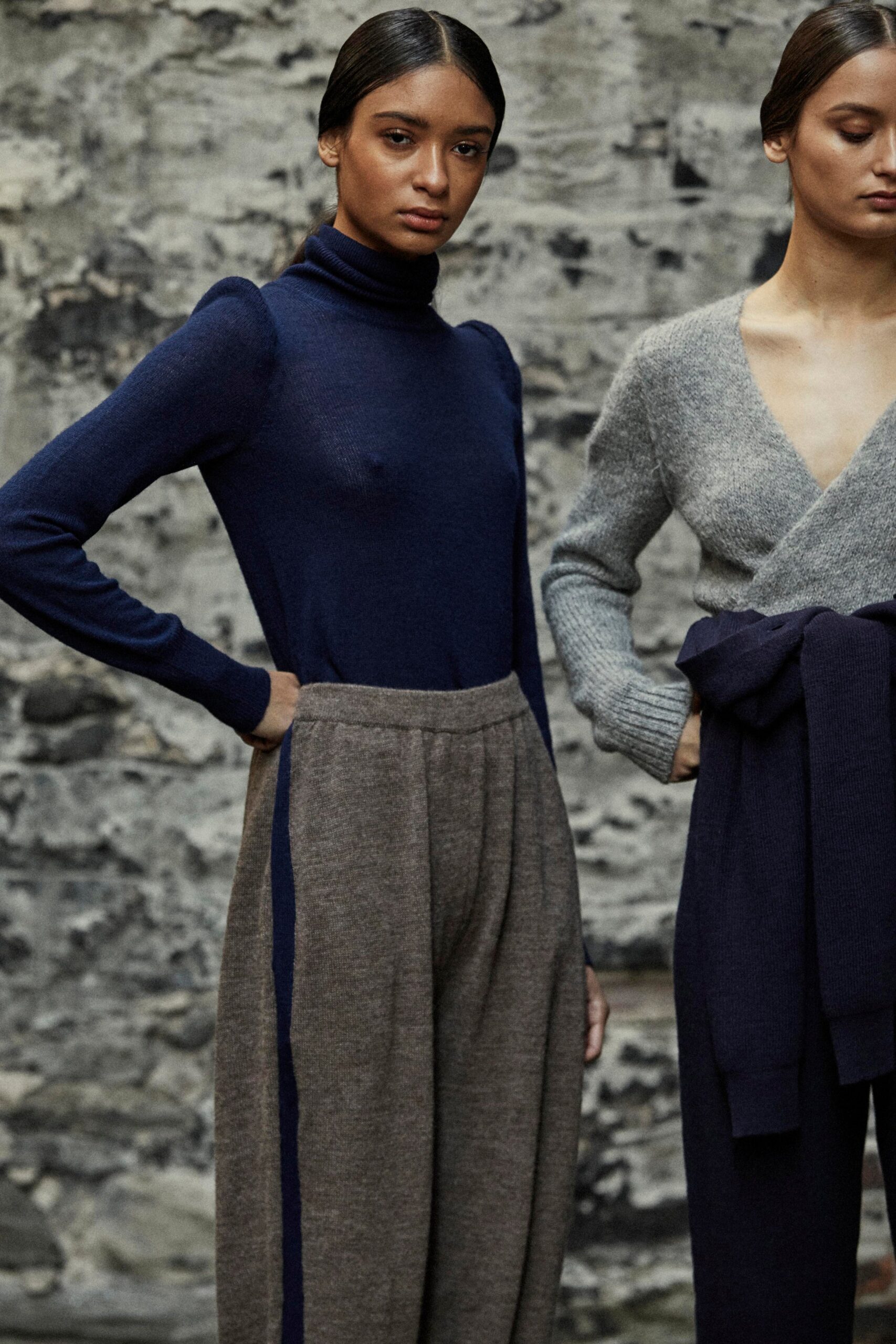 blue fitted wool top and brown relaxed pants