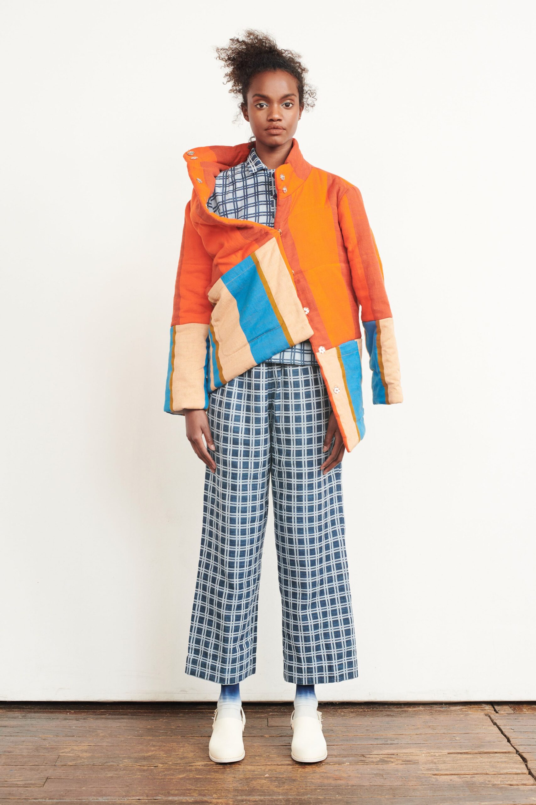 color-blocked jacket with checked shirt