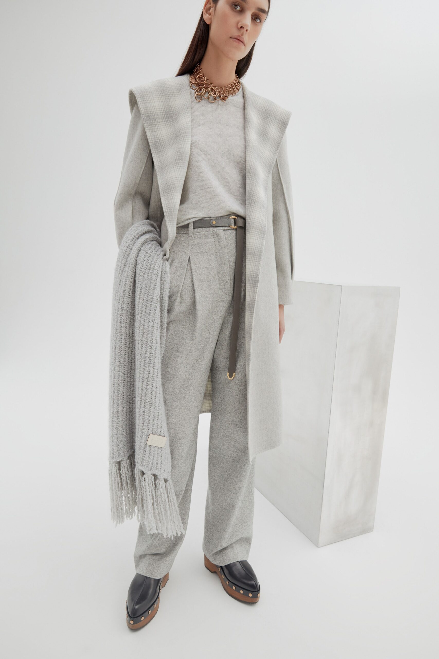 gray wool coat and tailored pants