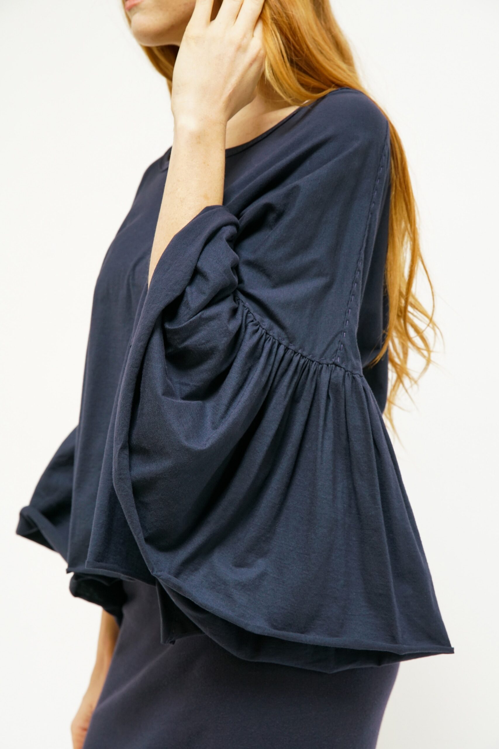 blue relaxed top with ruffled sleeves