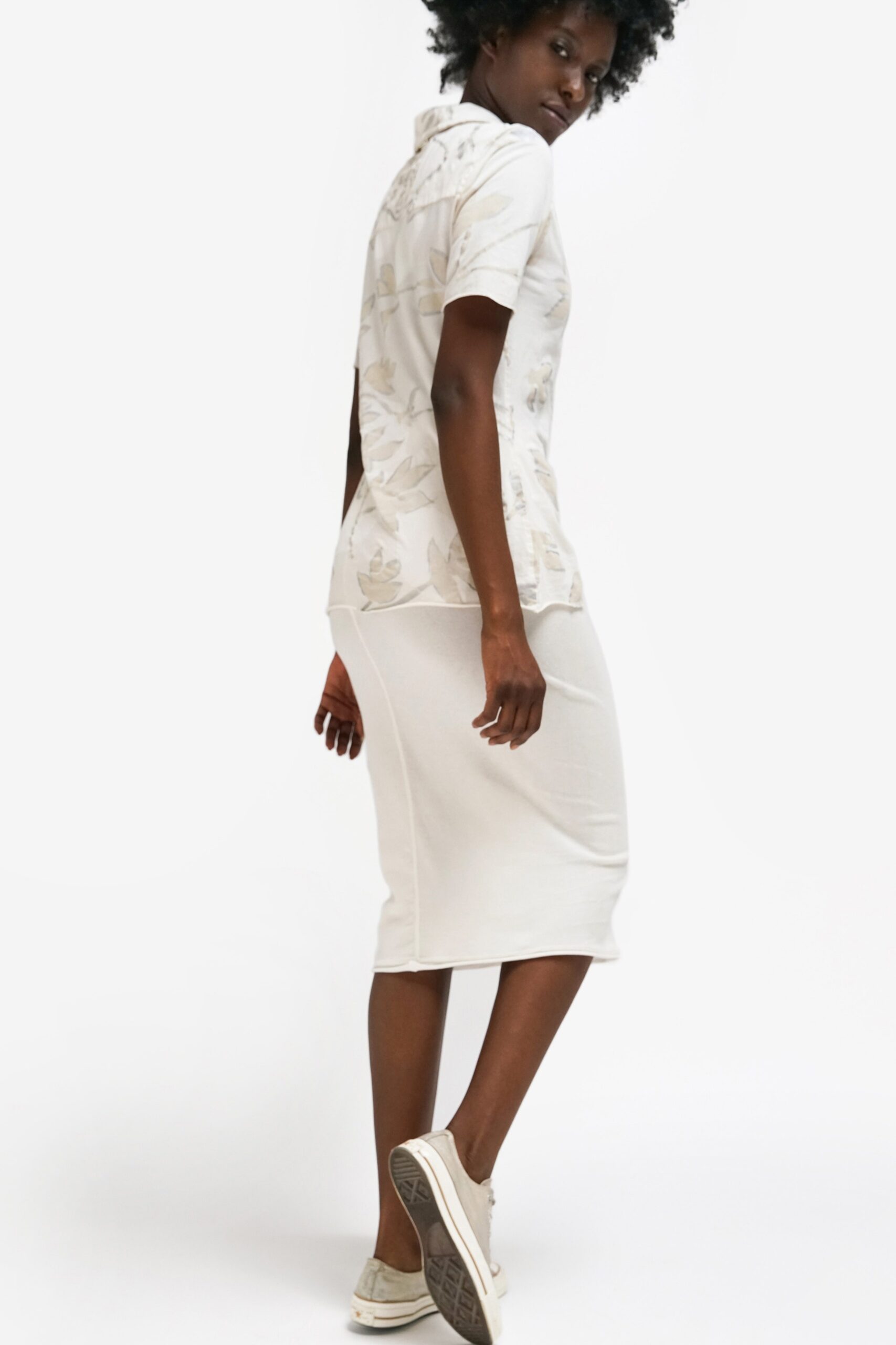 white fitted top and midi skirt