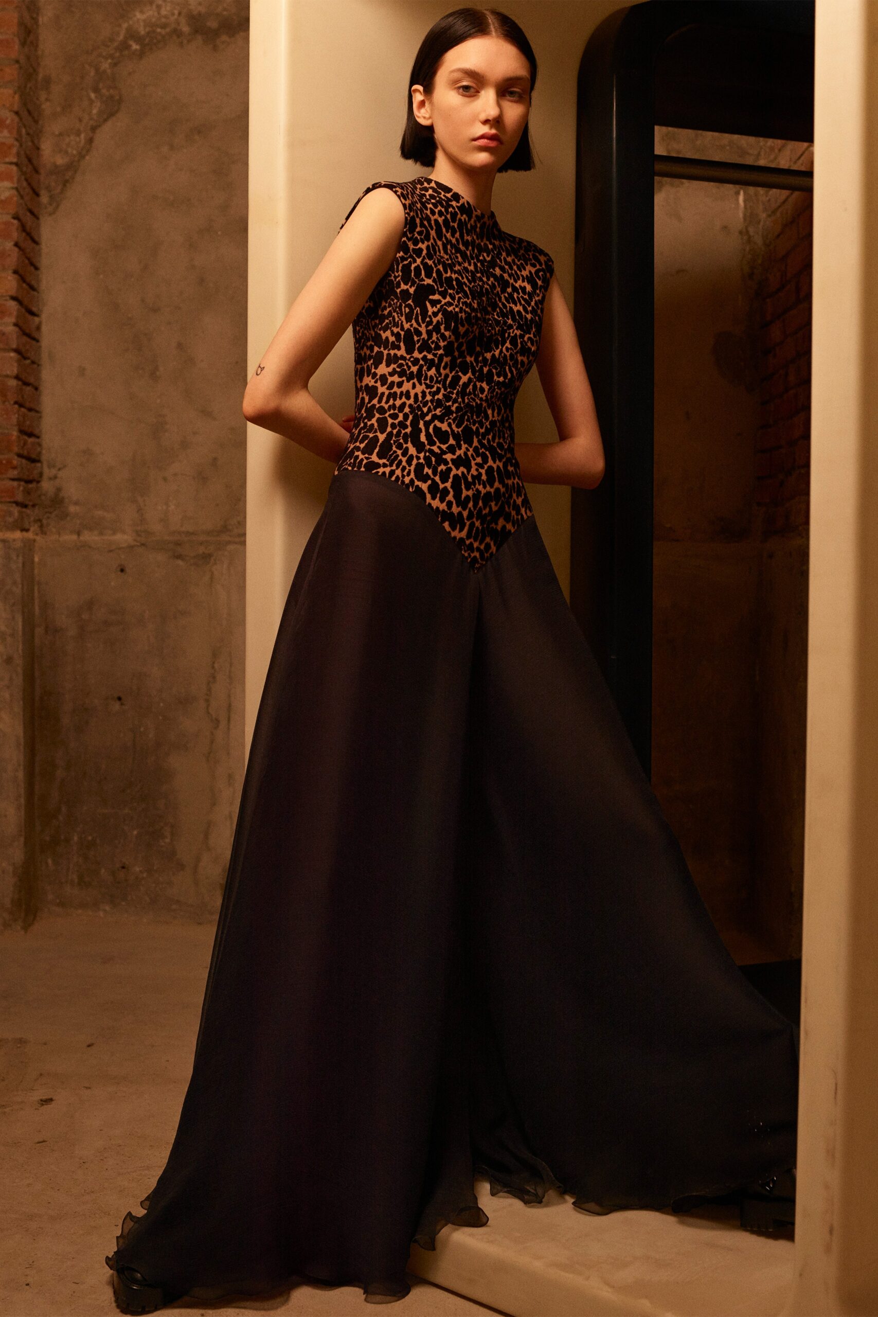 black and brown flared gown