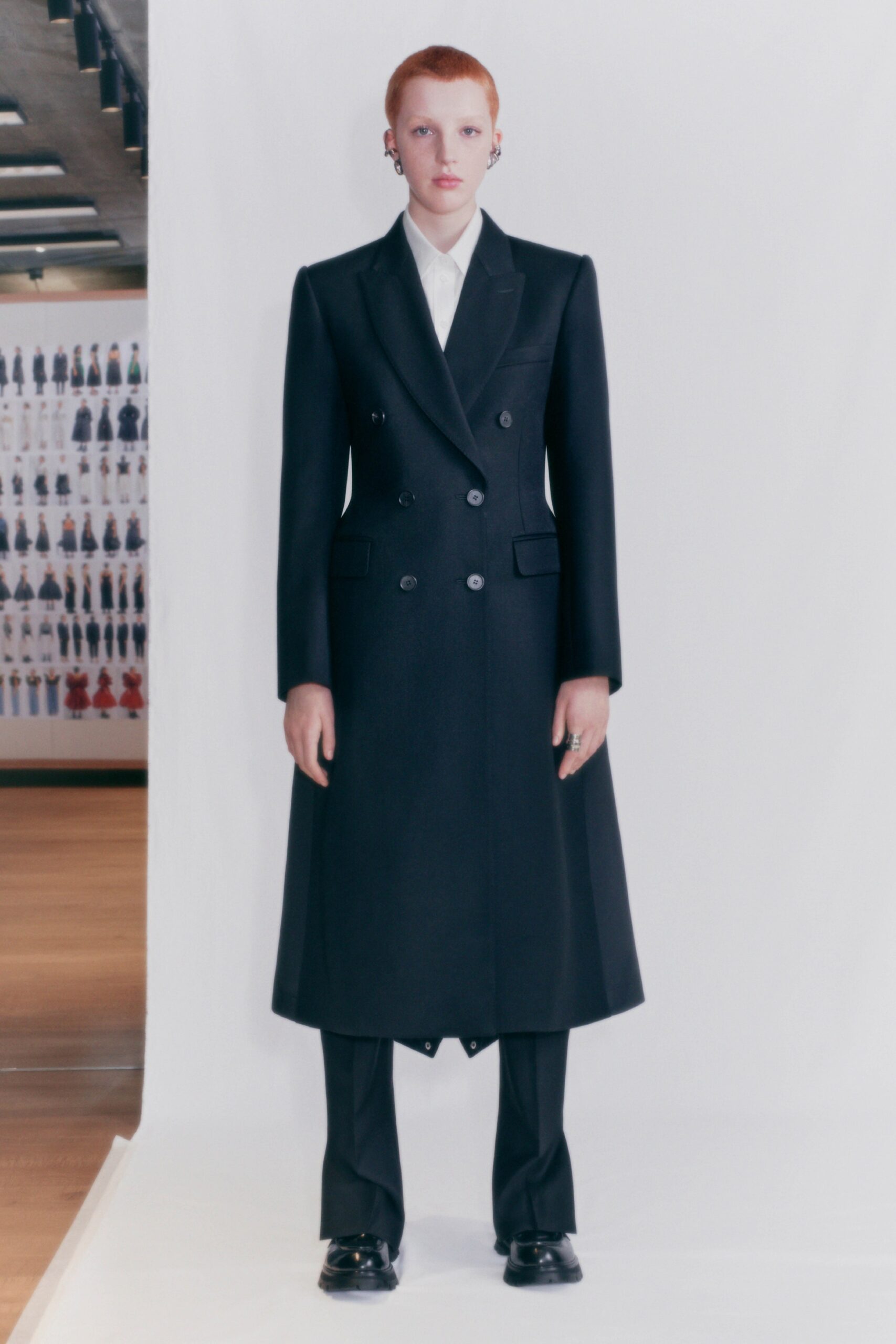 black wool long-sleeve collared tailored structured maxi coat