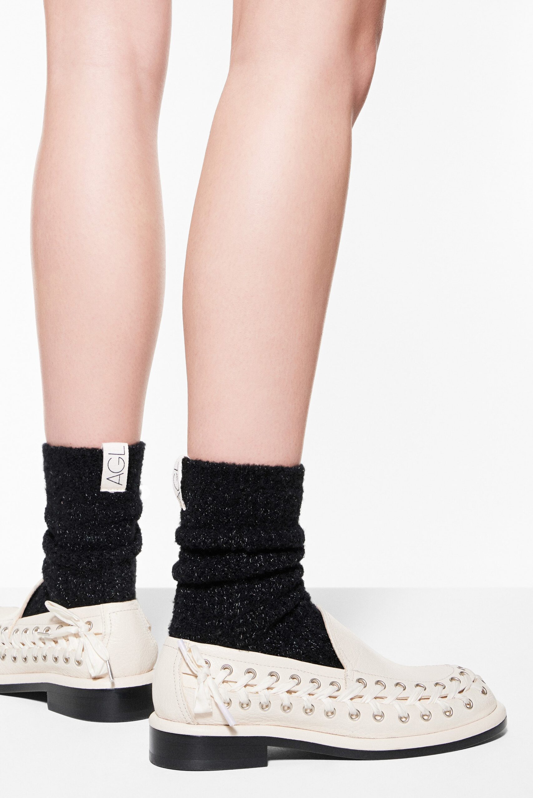 white leather shoes with black socks