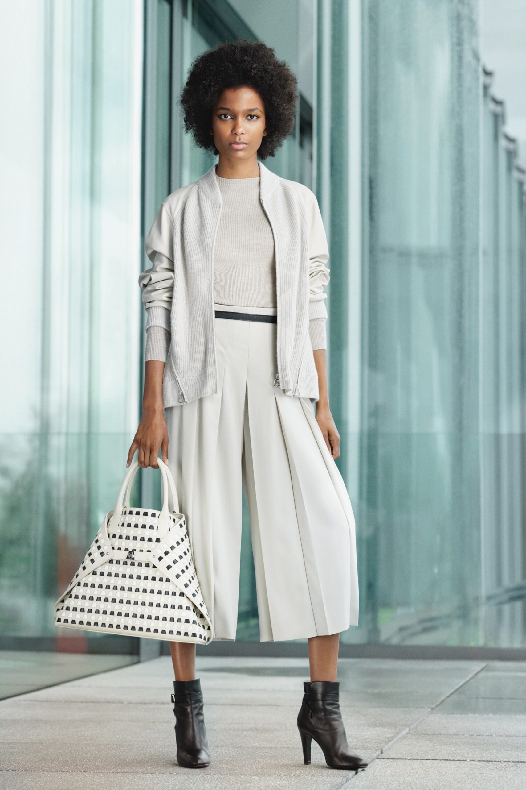 white relaxed jacket with pleated pants