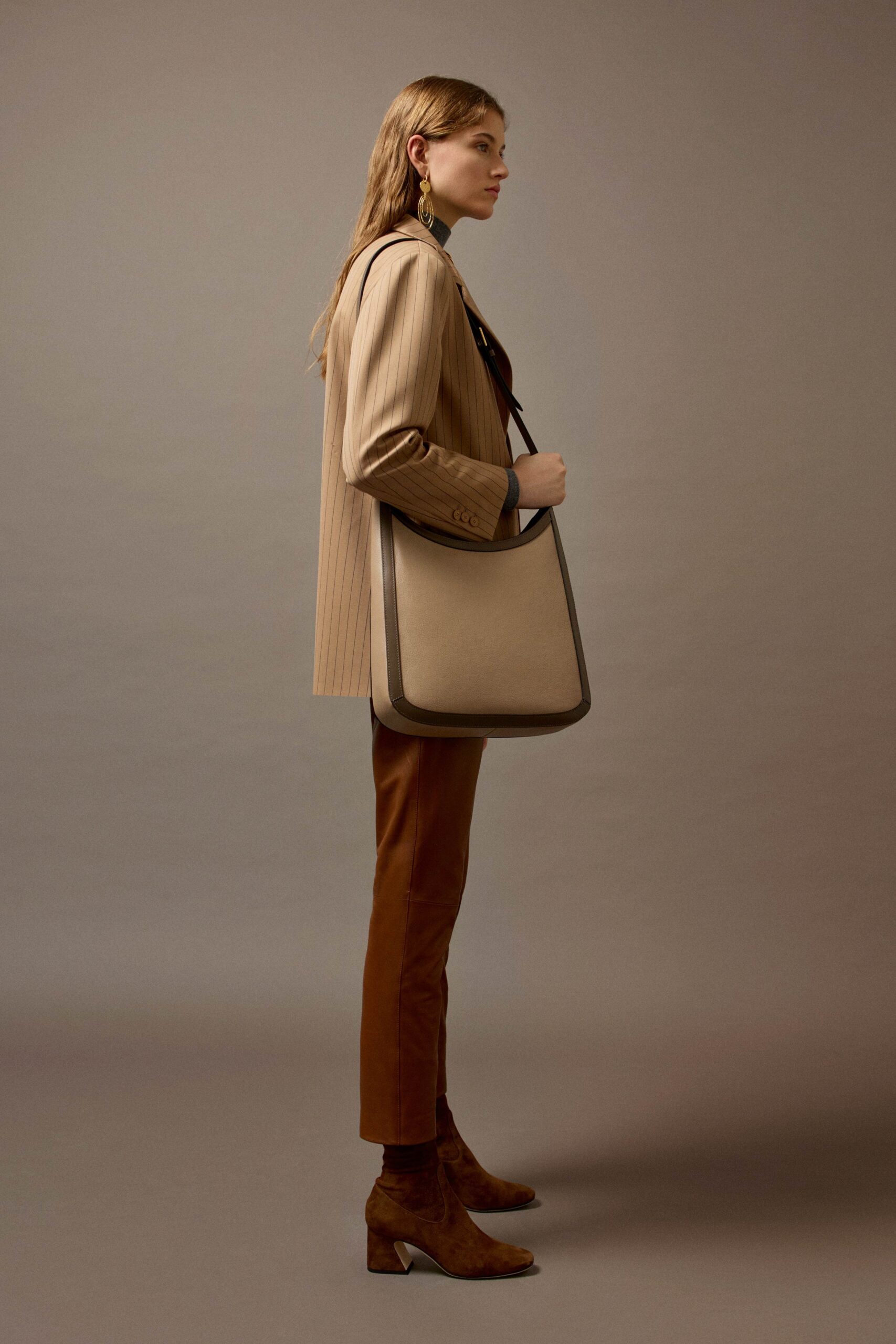 beige tailored blazer with brown pants