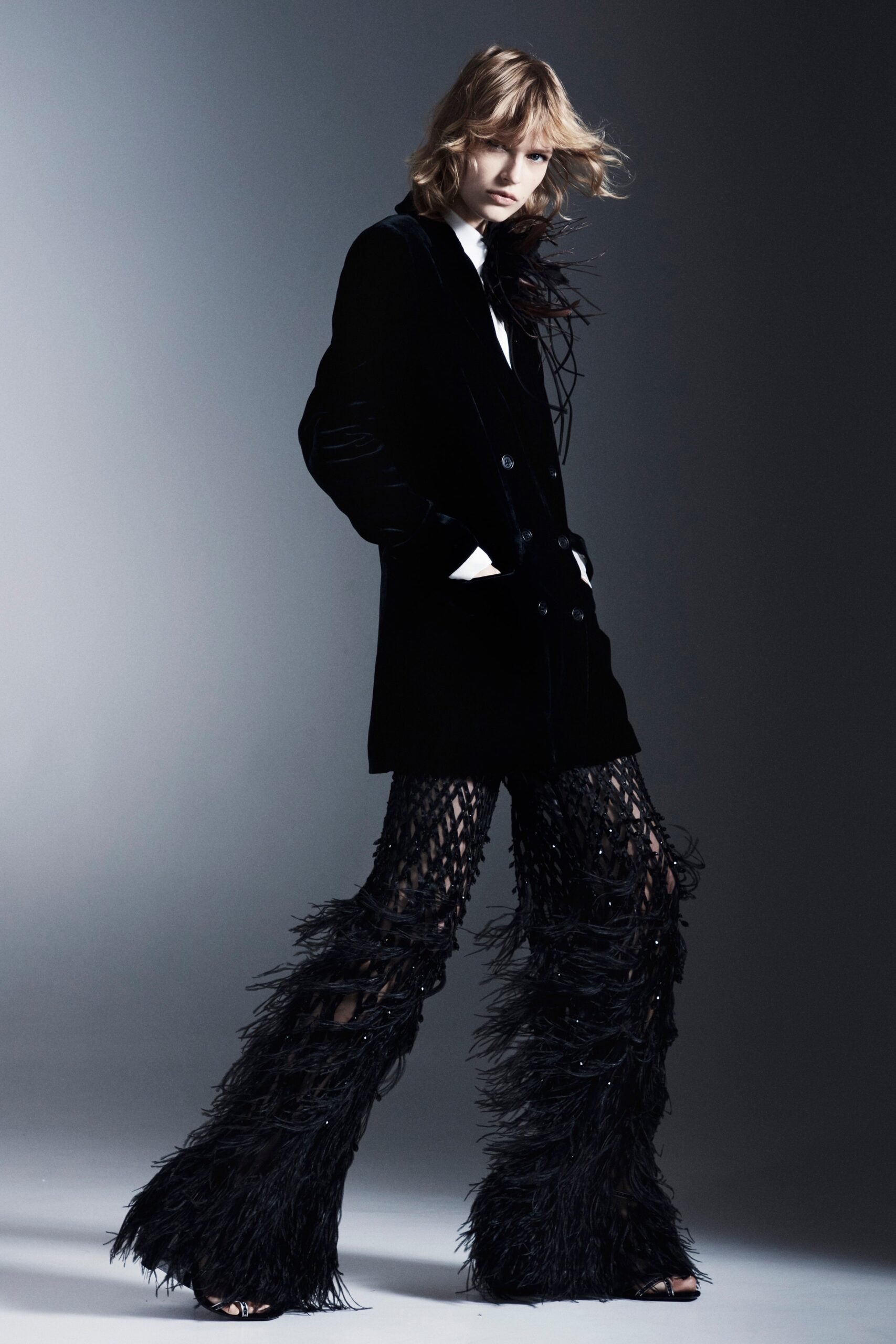 black velvet blazer and fringed pants