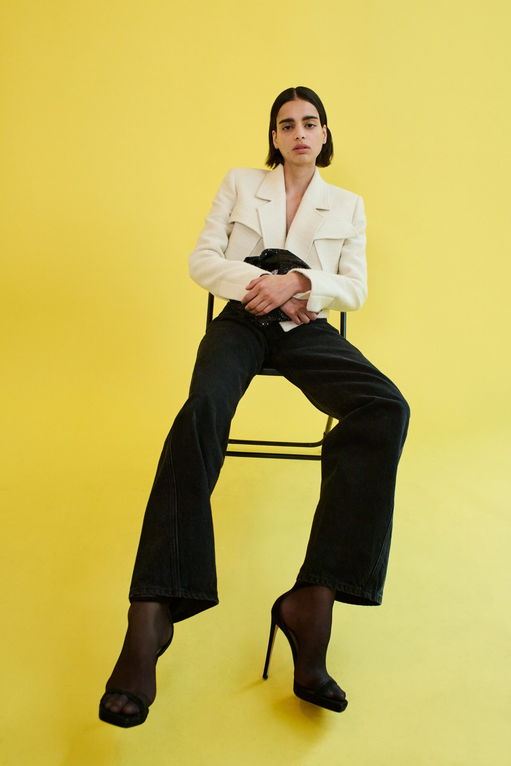 white tailored blazer black pants