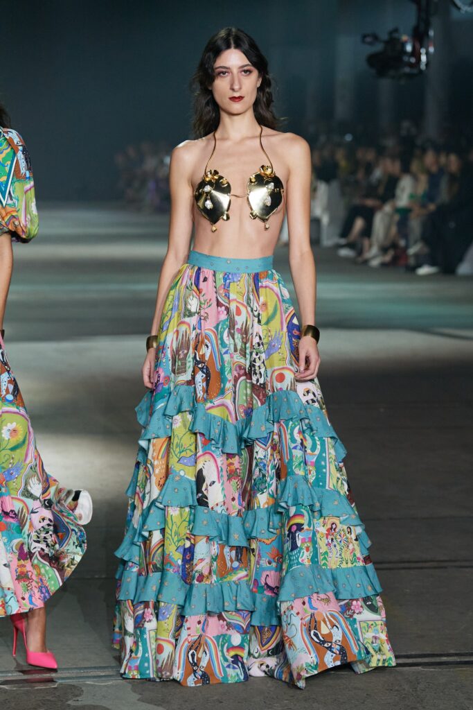 gold metallic sleeveless top with tiered maxi skirt