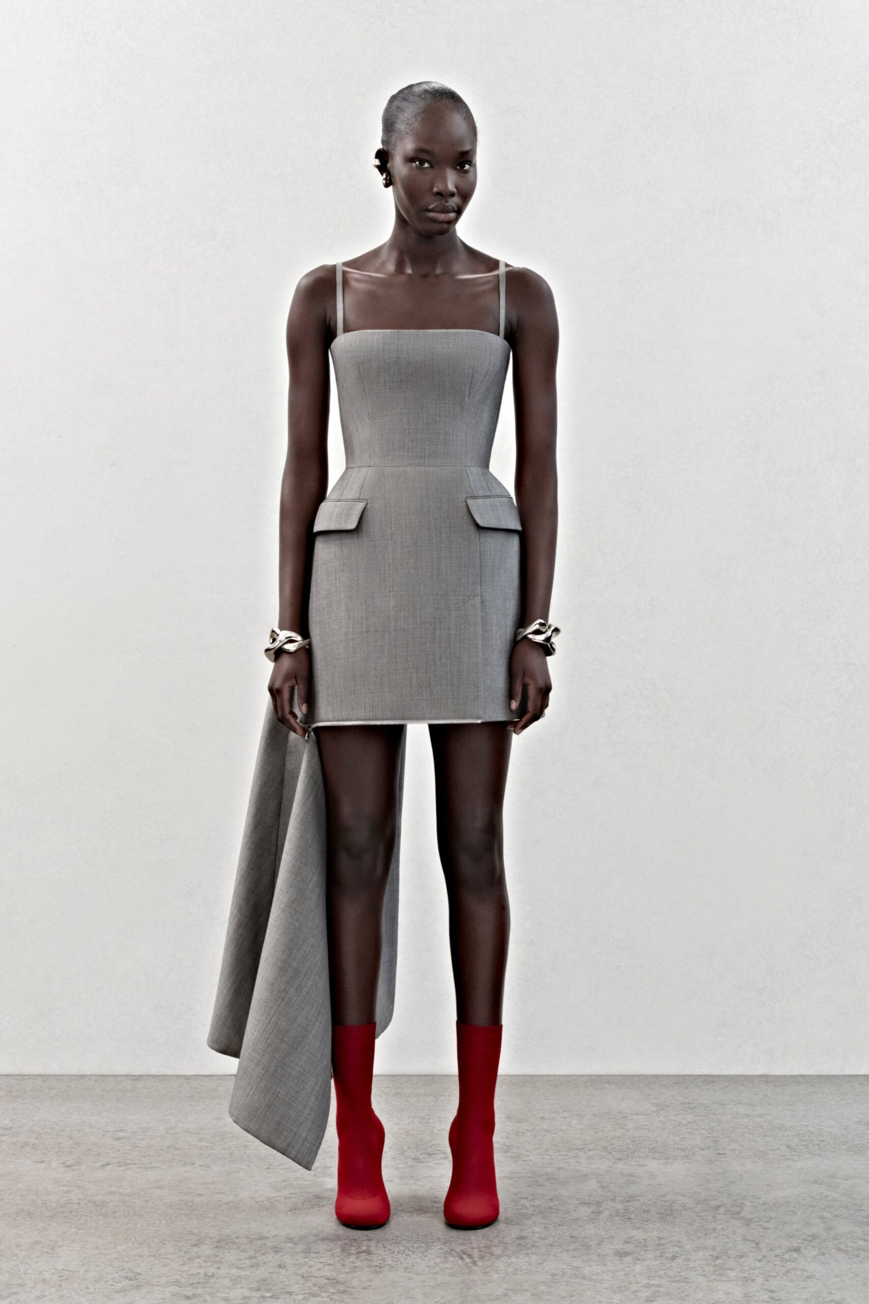 gray fitted mini dress with cape