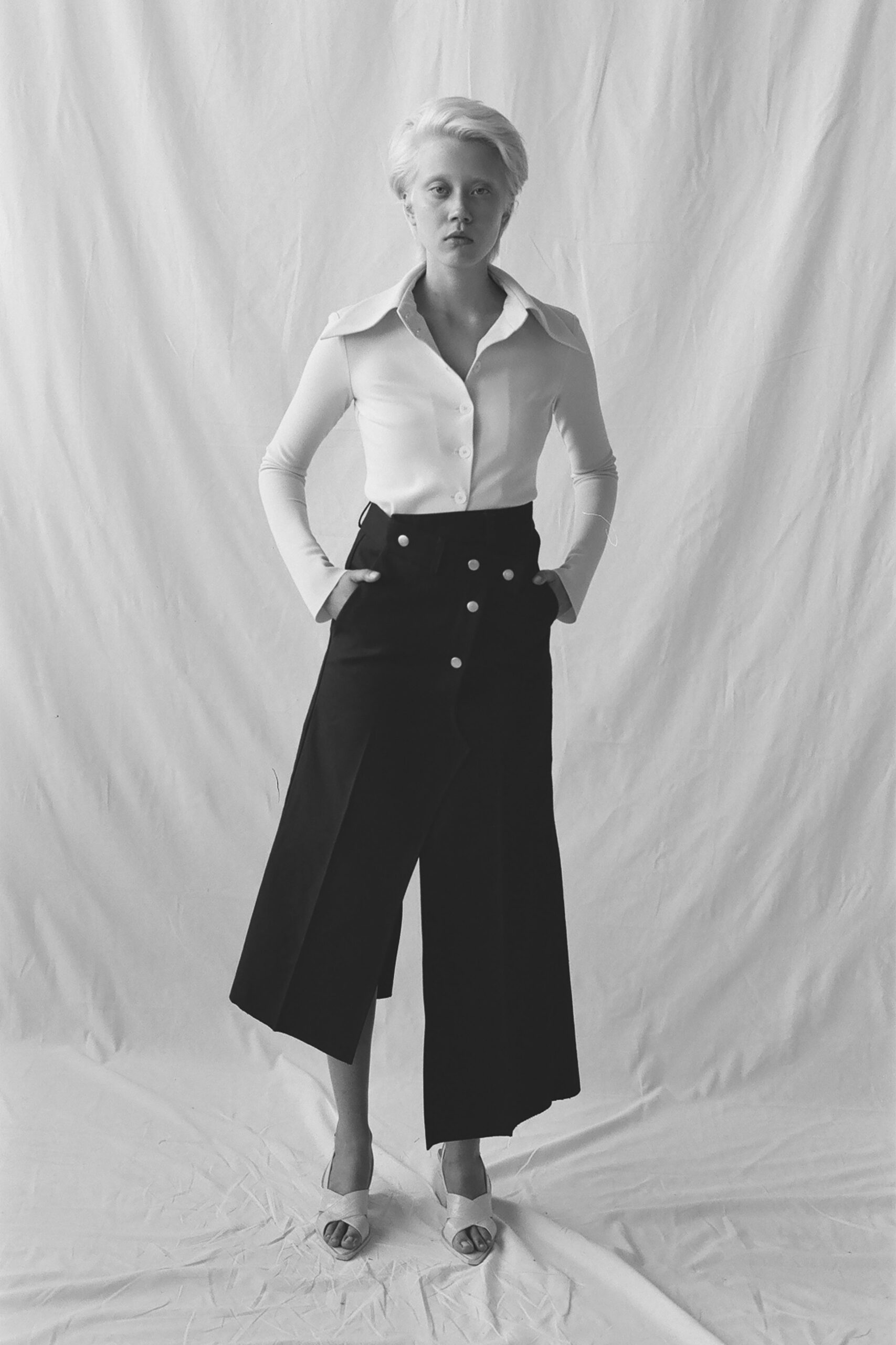 black cotton asymmetric fitted high-waisted buttoned skirt