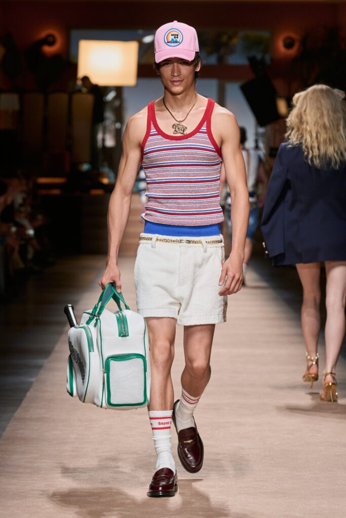 A fitted striped tank-top paired with high-waisted shorts, perfect for a casual summer look.