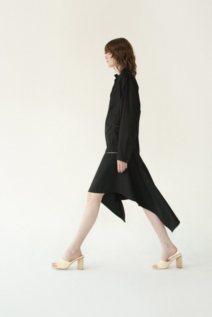 black fitted sleeveless dress