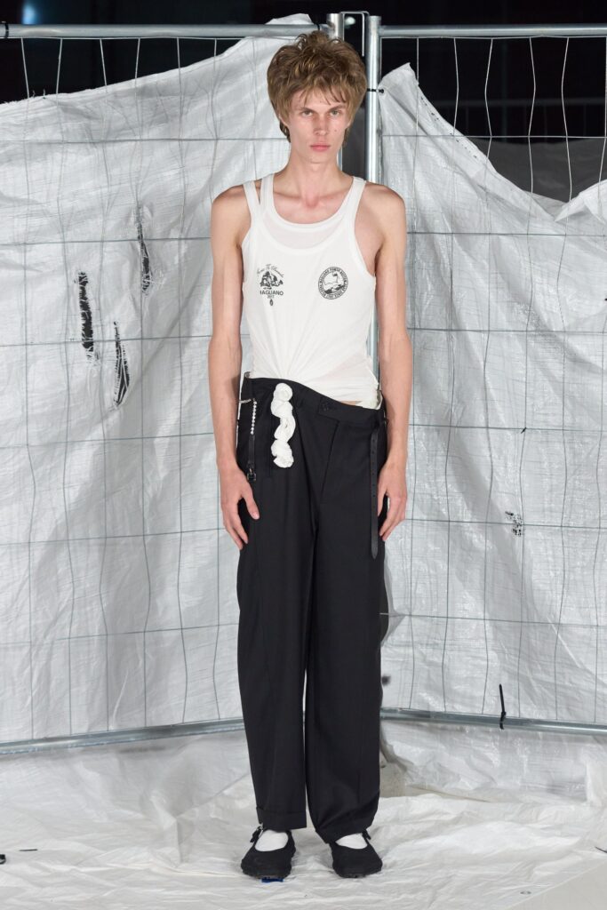 white fitted tank-top and black relaxed pants