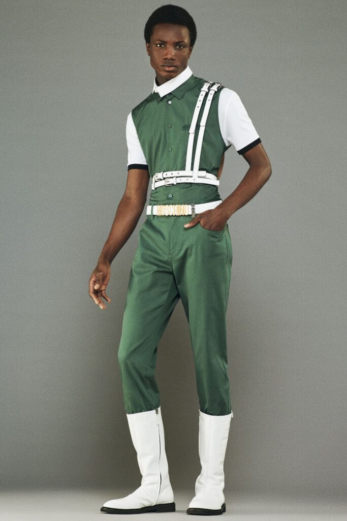 green fitted jumpsuit with white belt