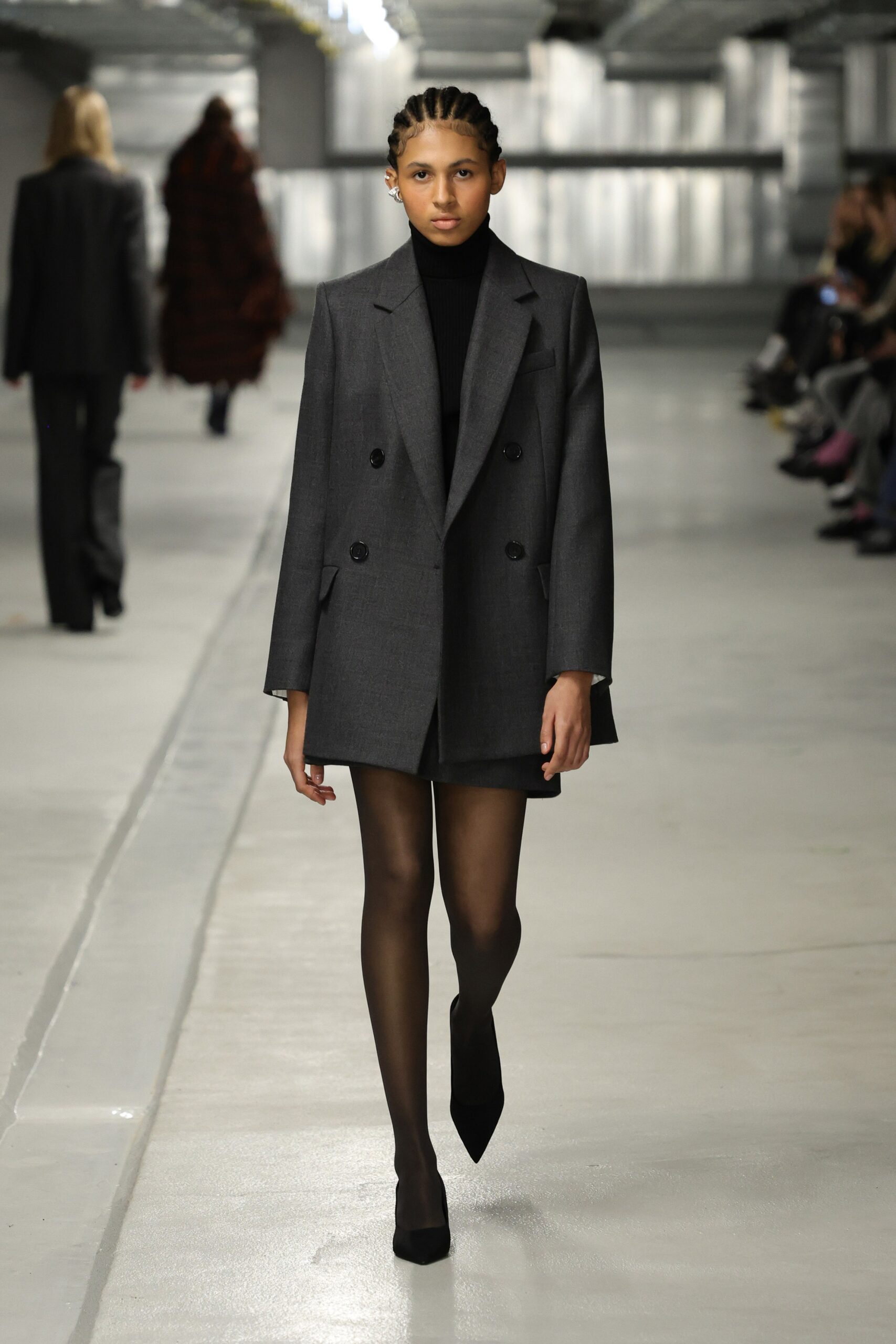 gray tailored blazer with mini black dress