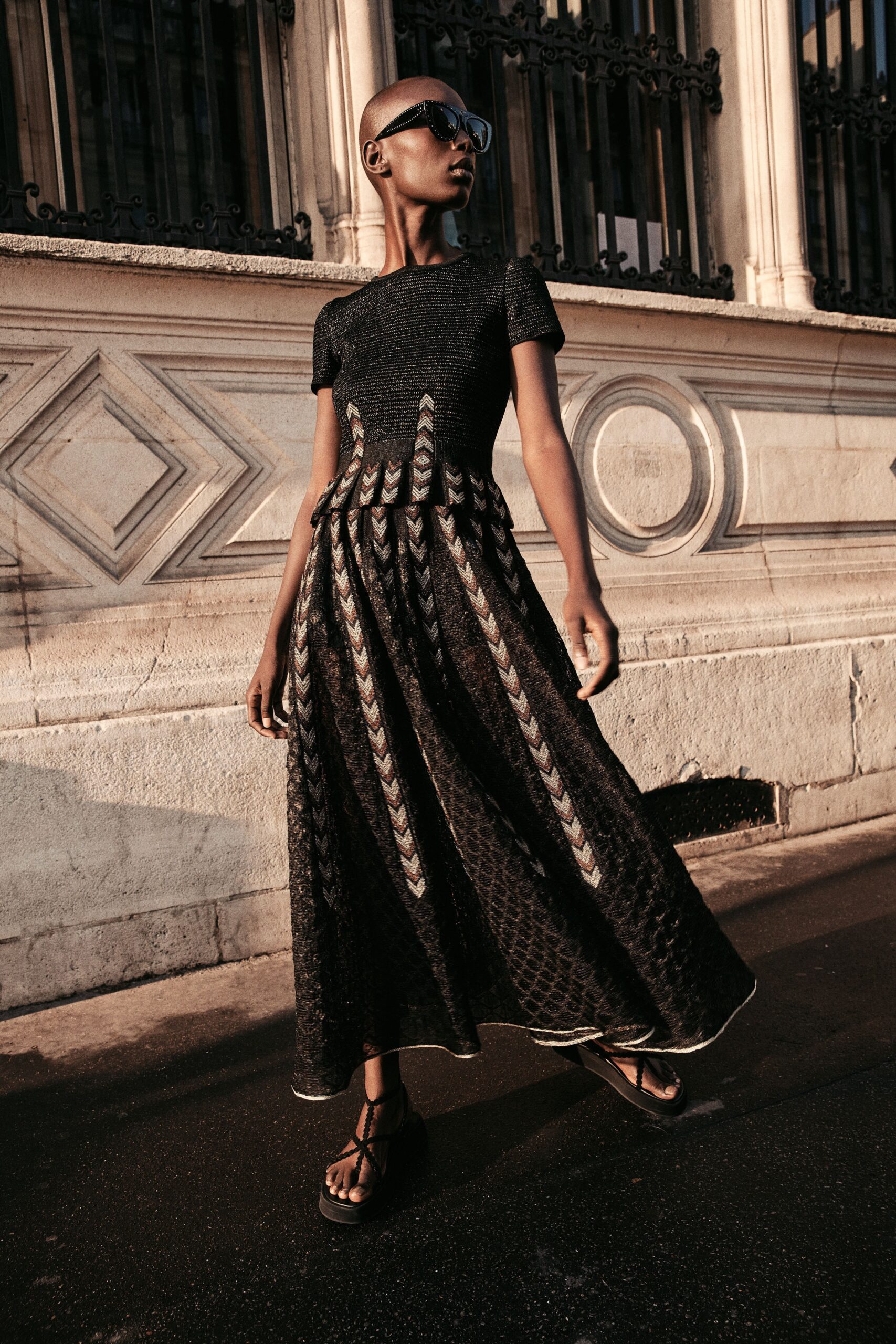 black silk short-sleeve high-neck fitted pleated layered dress