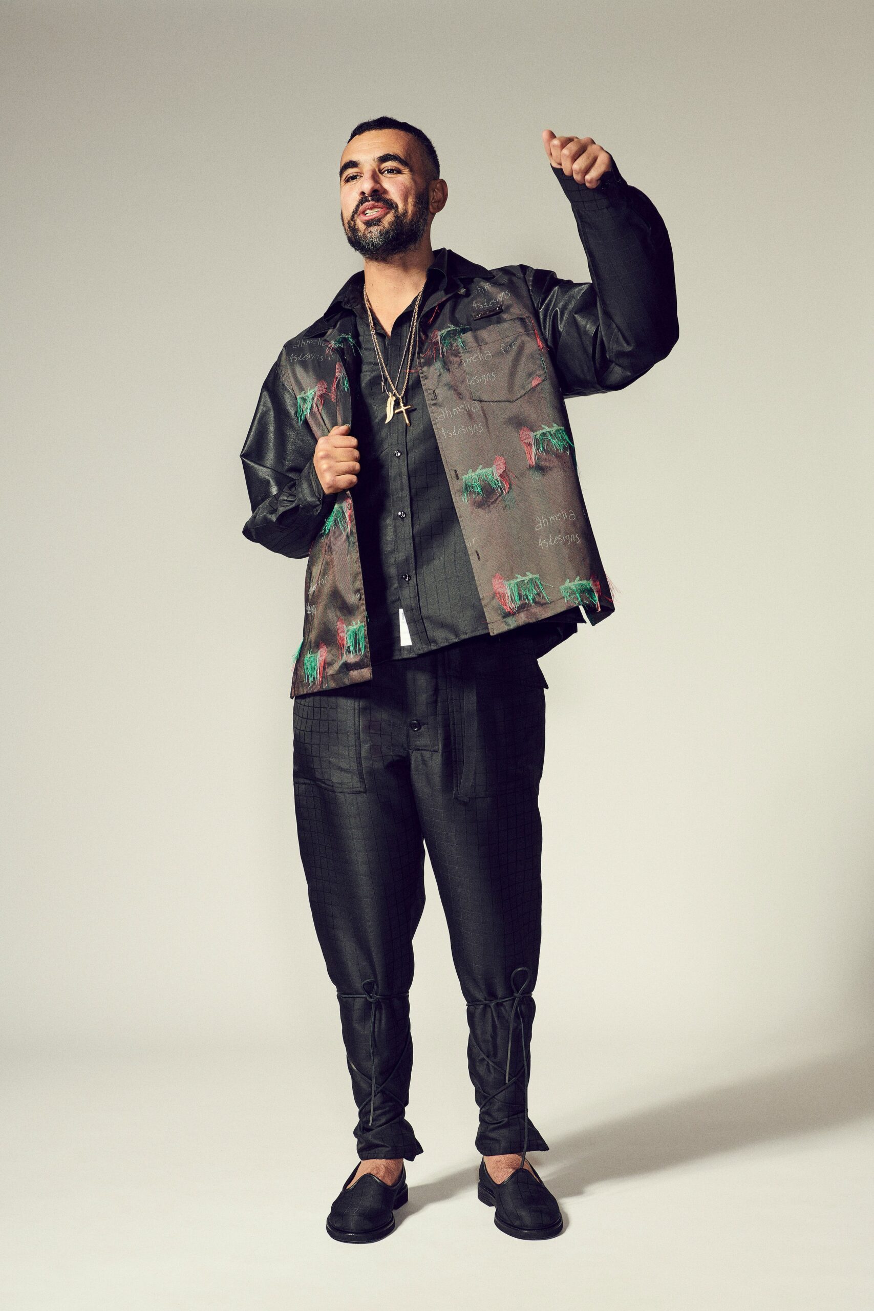 black relaxed jacket with printed details